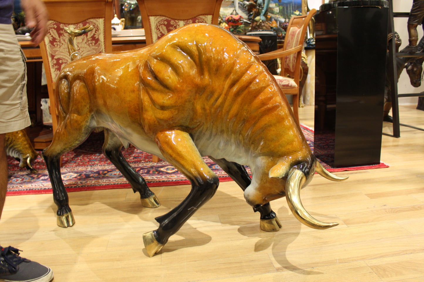 Bull Heads Down -Large Bronze Statue - Size: 48"L x 12"W x 30"H.