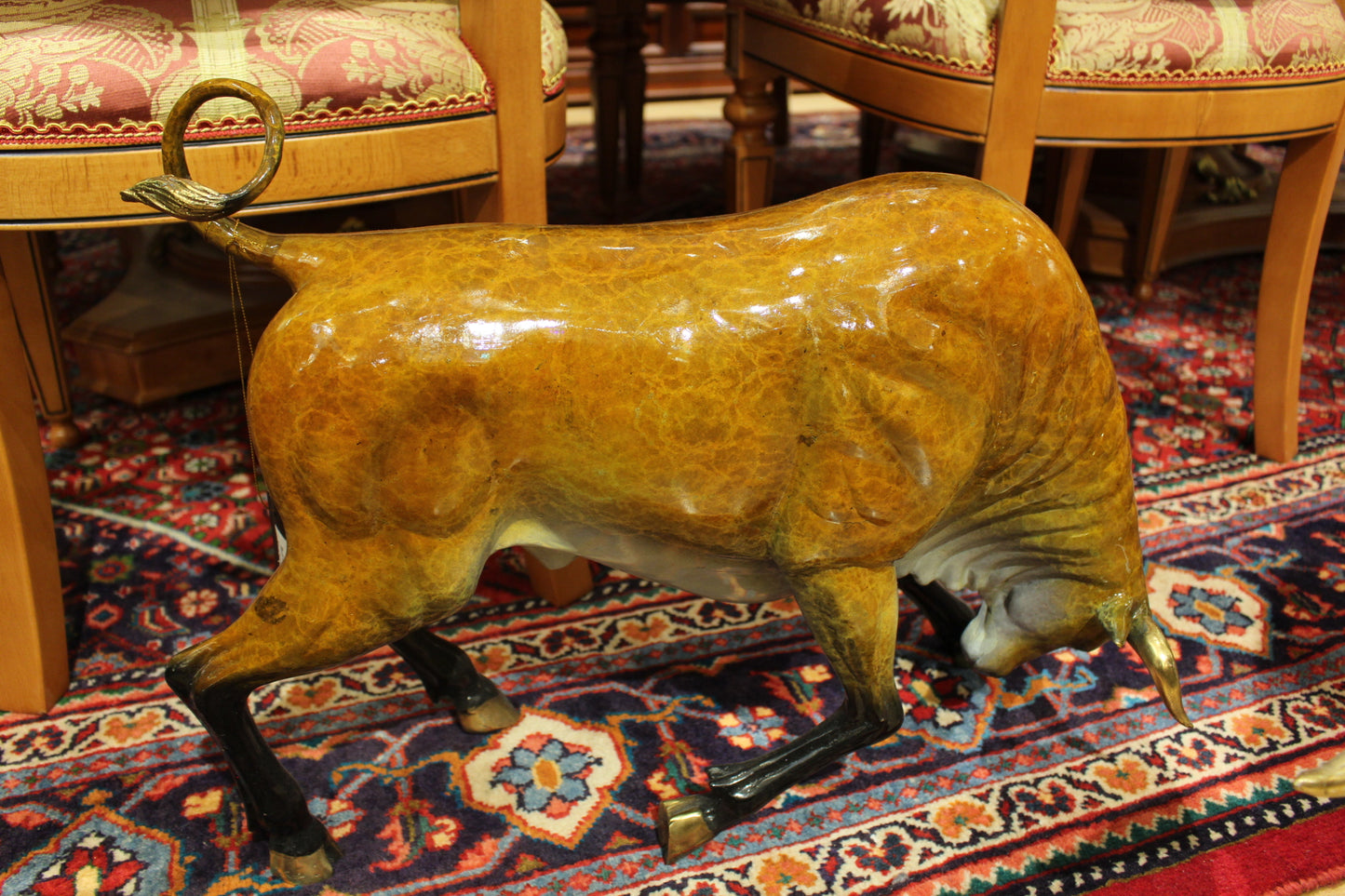 Bull Heads Down -Large Bronze Statue - Size: 48"L x 12"W x 30"H.