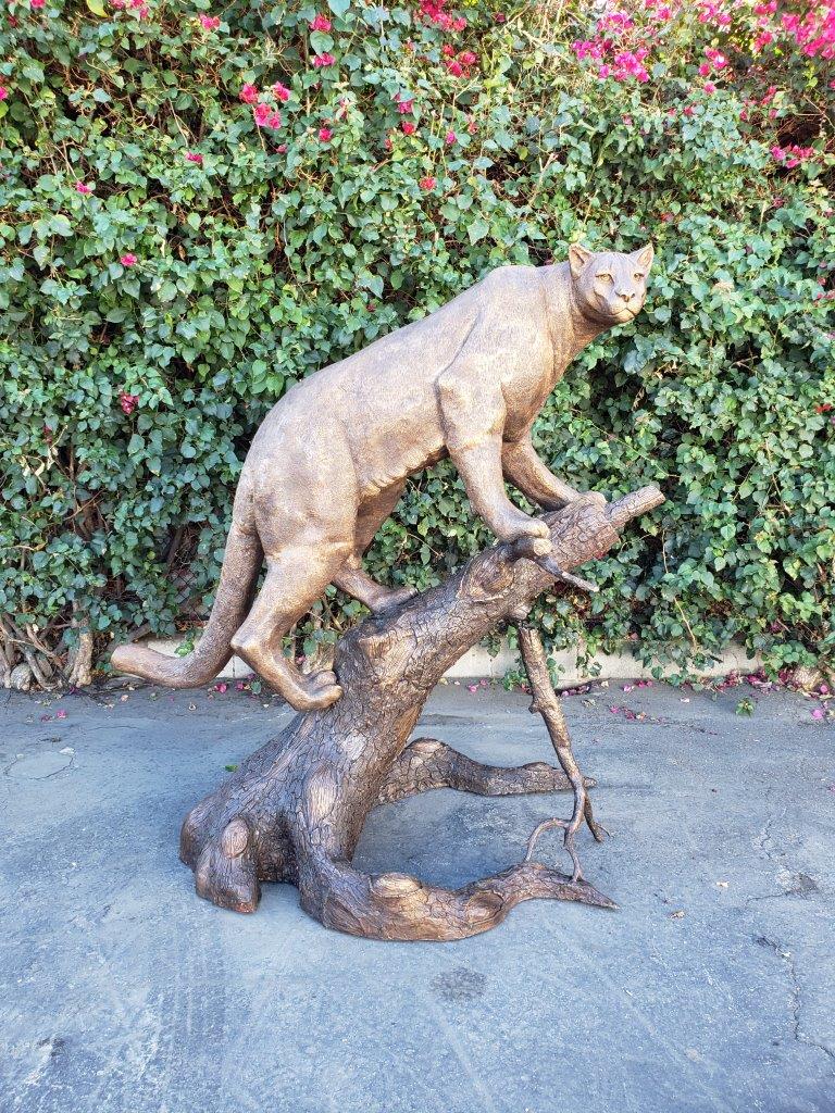 Mountain Lion Going Up a Tree Log Bronze Statue - Size: 42"L x 65"W x 69"H.