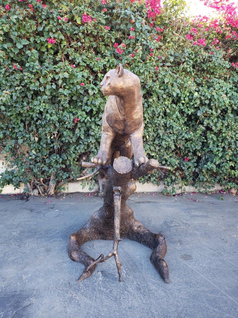 Mountain Lion Going Up a Tree Log Bronze Statue - Size: 42"L x 65"W x 69"H.