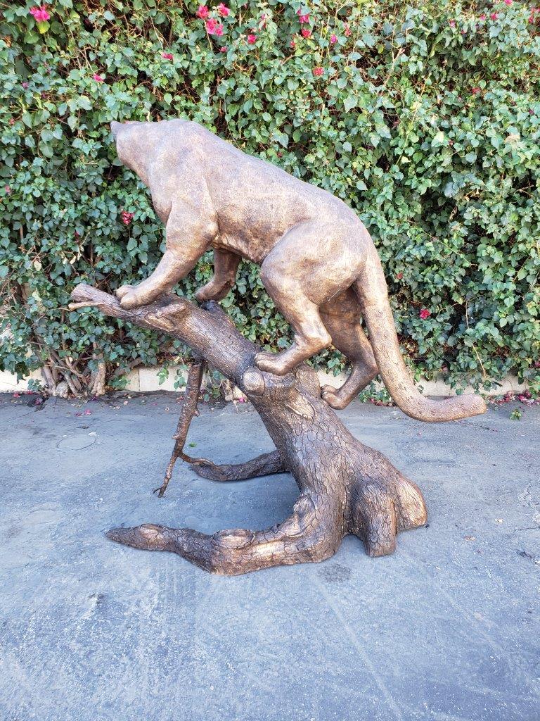 Mountain Lion Going Up a Tree Log Bronze Statue - Size: 42"L x 65"W x 69"H.
