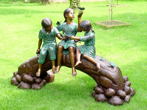 Three Kids Playing With Butterflies Bronze Statue - Size: 70"L x 25"W x 45"H.