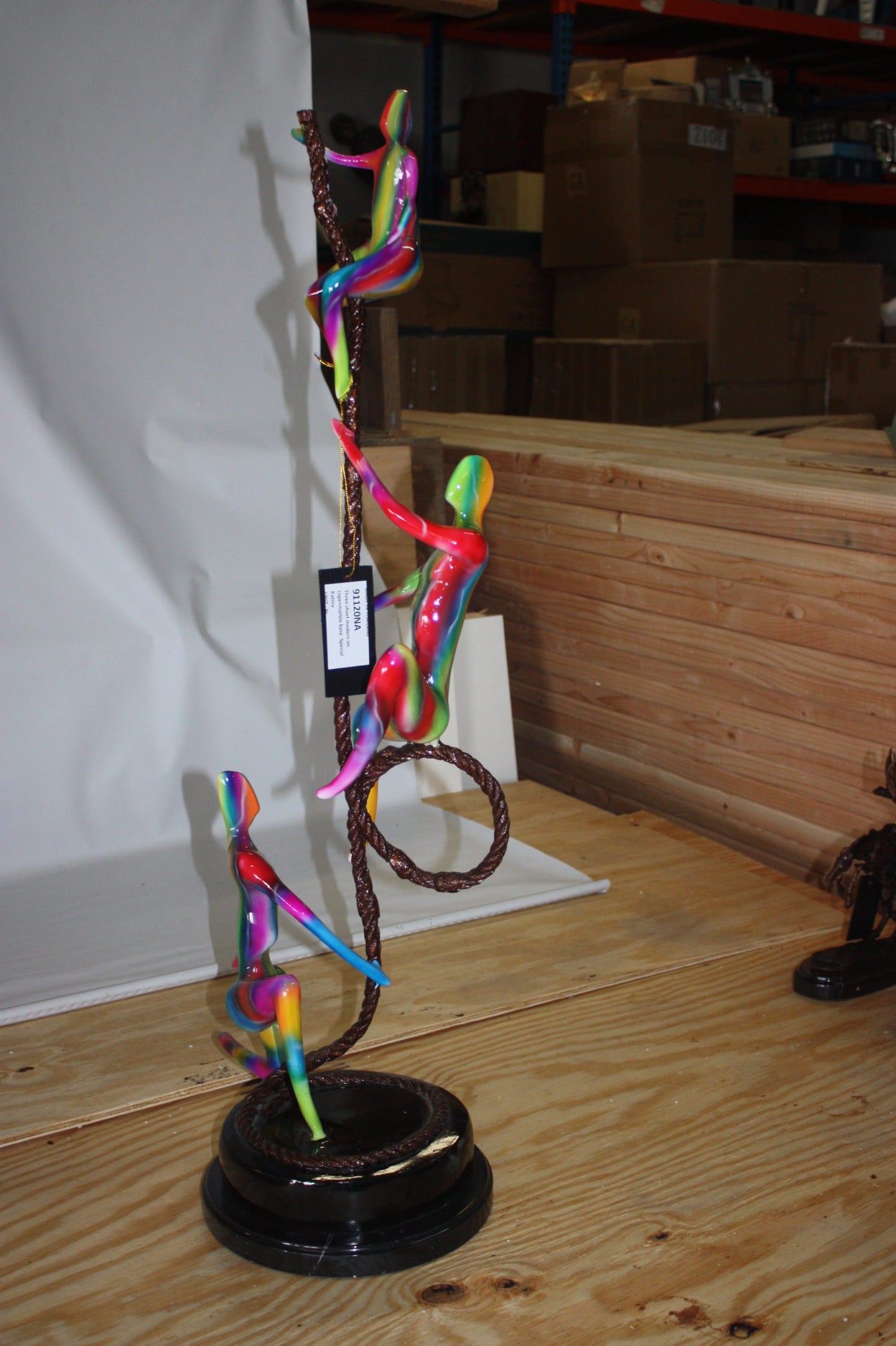 Three man made of Bronze climbing on rope - Size: 10"L x 13"W x 37"H.