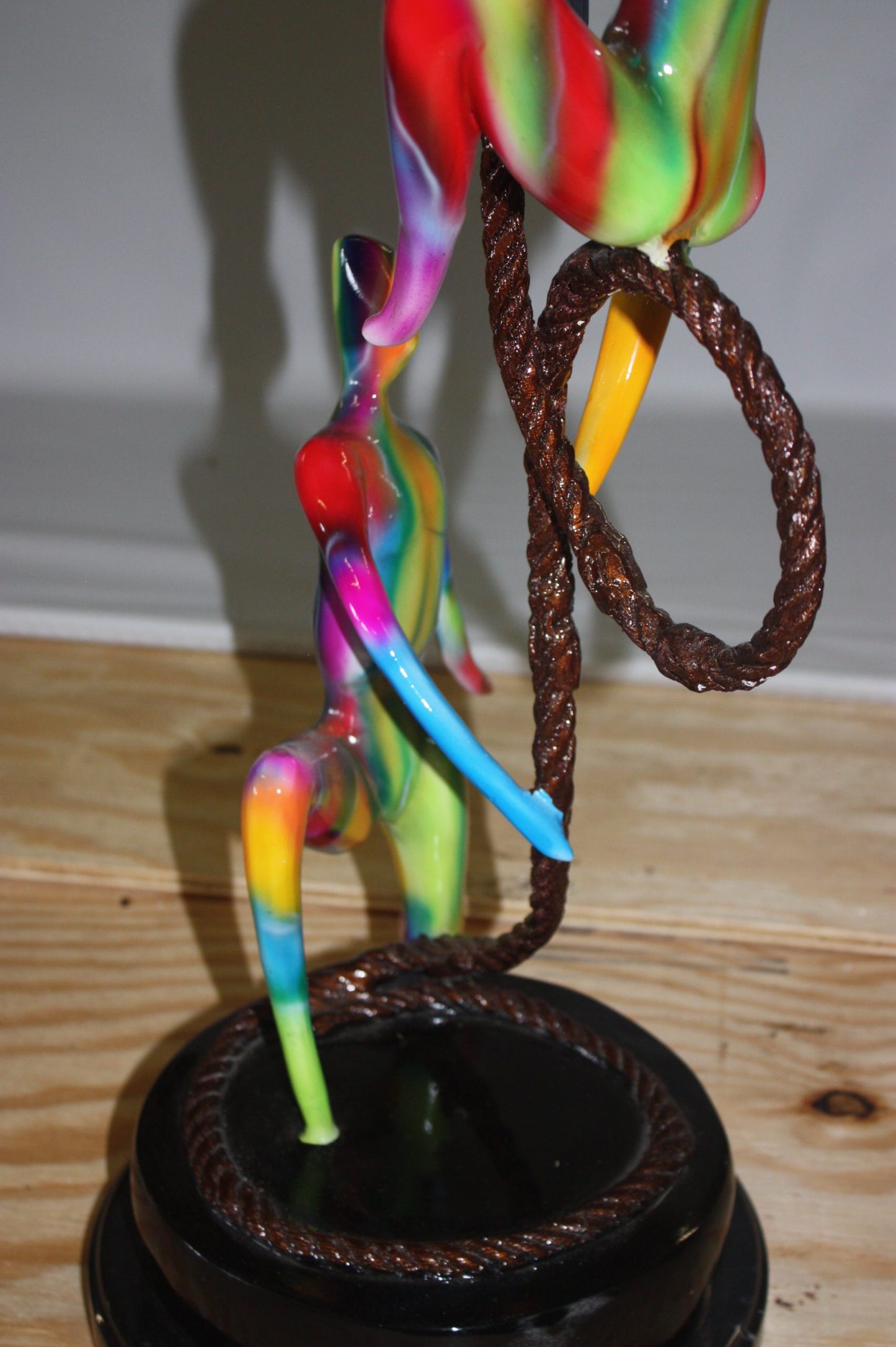 Three man made of Bronze climbing on rope - Size: 10"L x 13"W x 37"H.