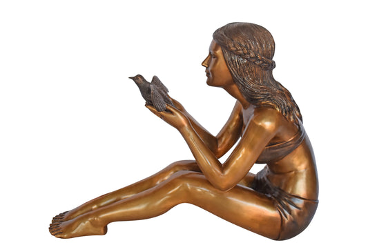 Young Beautiful Girl Helping A Bird Fly - Size: 22"L x 7"W x 18"H.