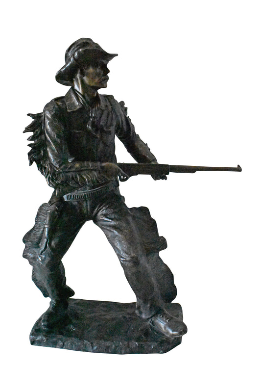 Cowboy with His Gun Bronze Statue - Size: 26"L x 13"W x 33"H.