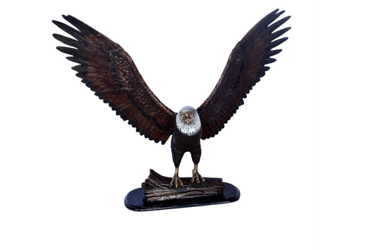 Perched eagle bronze statue -  Size: 35"L x 21"W x 29"H.
