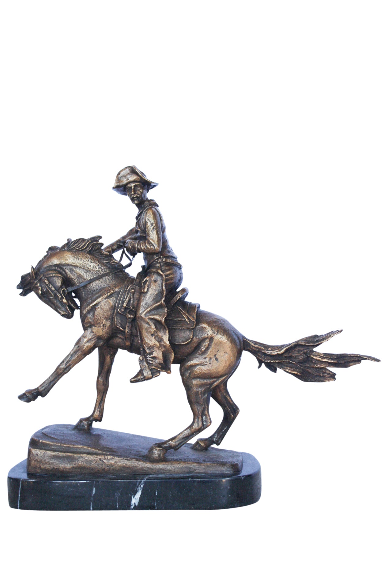 Remington replica Cowboy bronze statue - Size: 5"L x 15"W x 13"H.