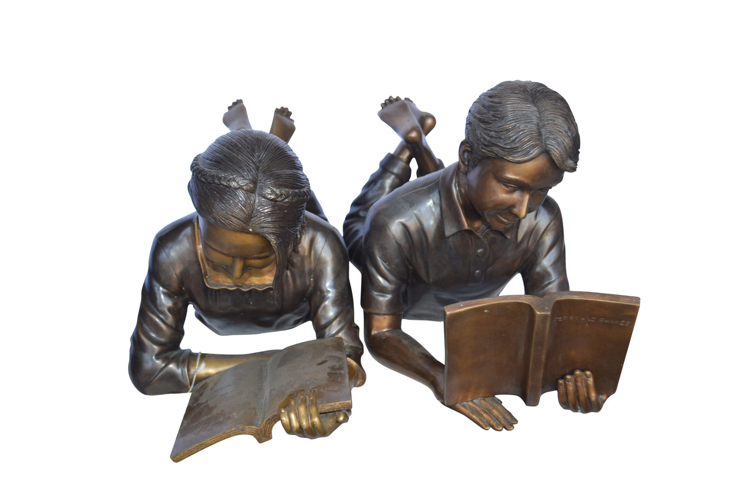 A Set of Boy and Girl Reading Books Bronze Statue - Size: 31"L x 10"W x 14"H.