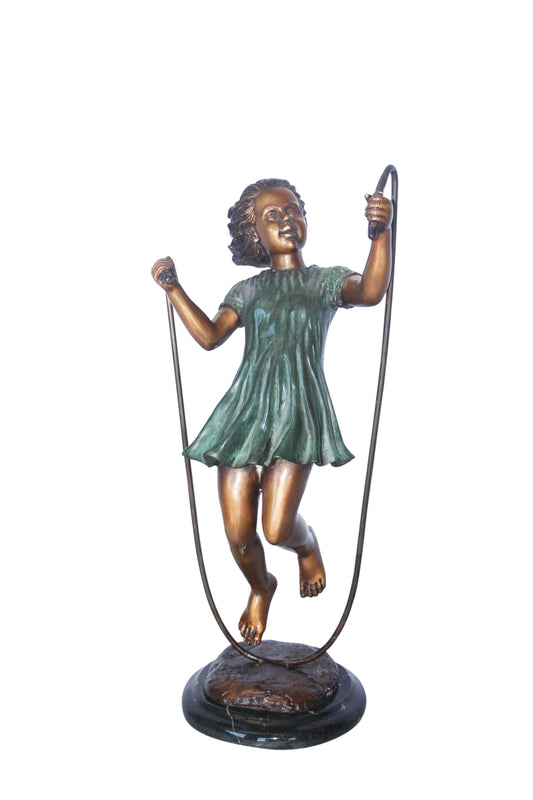 Young girl jump roping bronze statue -  Size: 5"L x 7"W x 15"H.