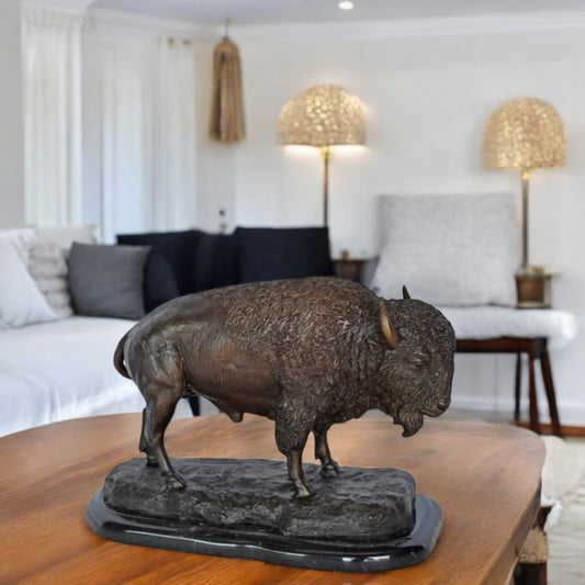 Bison standing and looking down Bronze Statue - Size: 11"L x 6"W x 8"H.