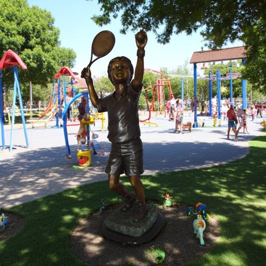 Boy Playing Tennis Bronze Statue - Size: 12"L x 8"W x 25"H.