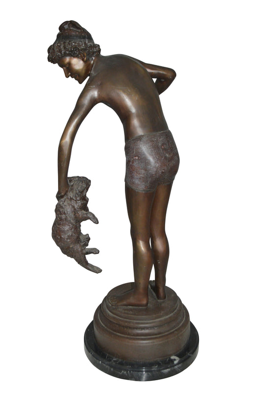 Boy holding a Dog and a Bird Bronze Statue - Size: 15"L x 15"W x 36"H.
