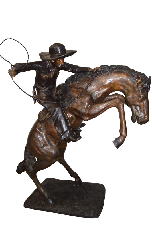 Bronco Buster Giant Bronze Statue - Size: 65"L x 52"W x 64"H.