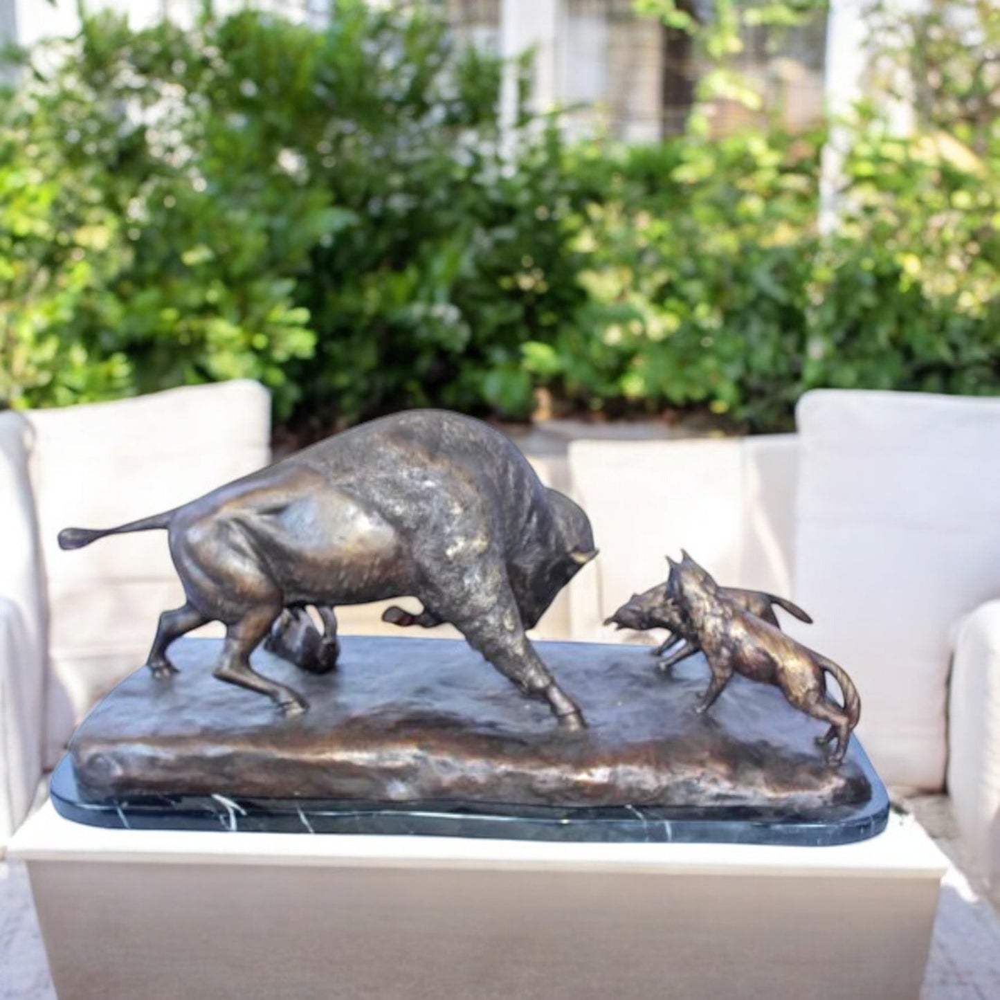 Charging bison v. Wolves bronze statue -  Size: 36"L x 17"W x 17"H.
