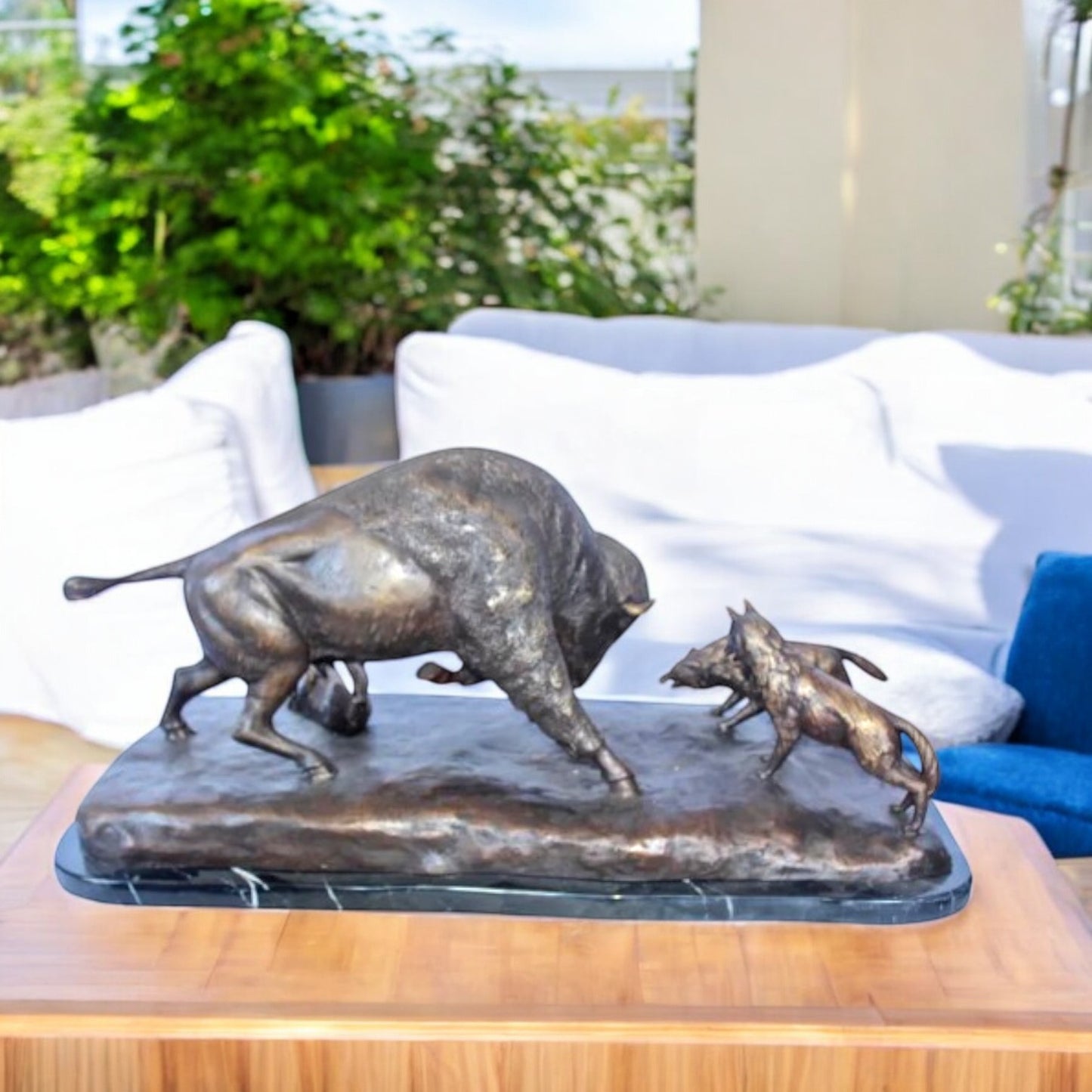 Charging bison v. Wolves bronze statue -  Size: 36"L x 17"W x 17"H.