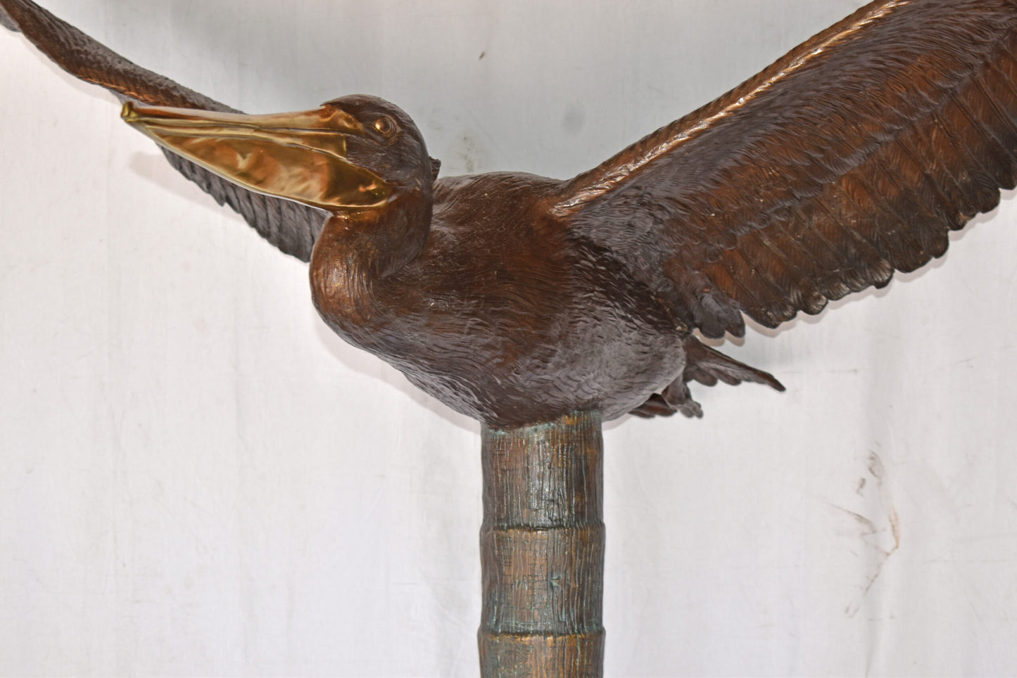 Life Size Pelican Flying Bronze Status - Size: 69"L x 45"W x 88"H.