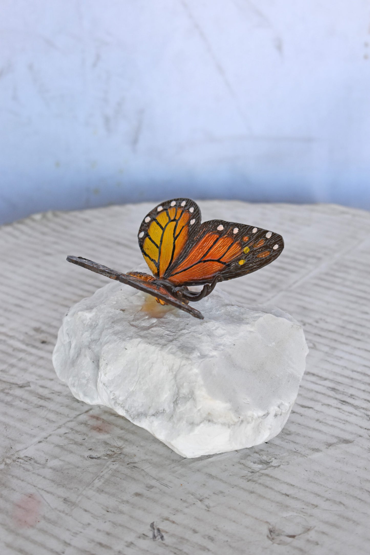 Black and Orange Butterfly made of Bronze mounted on a rock Size: 5" x 5" x 4"H