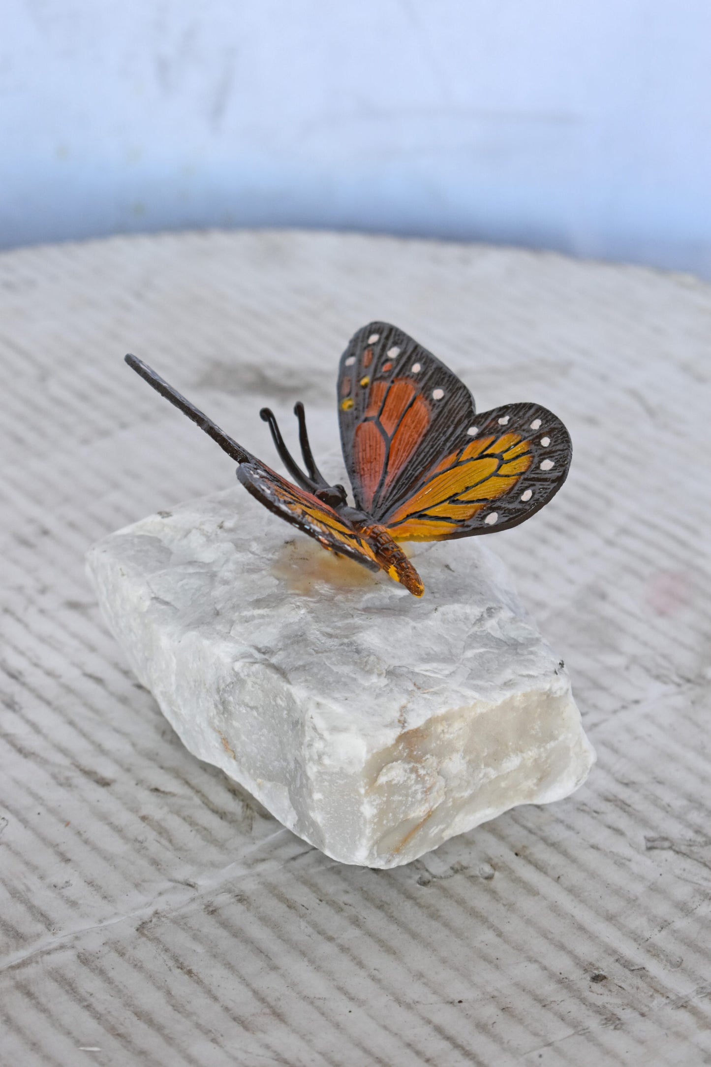 Black and Orange Butterfly made of Bronze mounted on a rock Size: 5" x 5" x 4"H