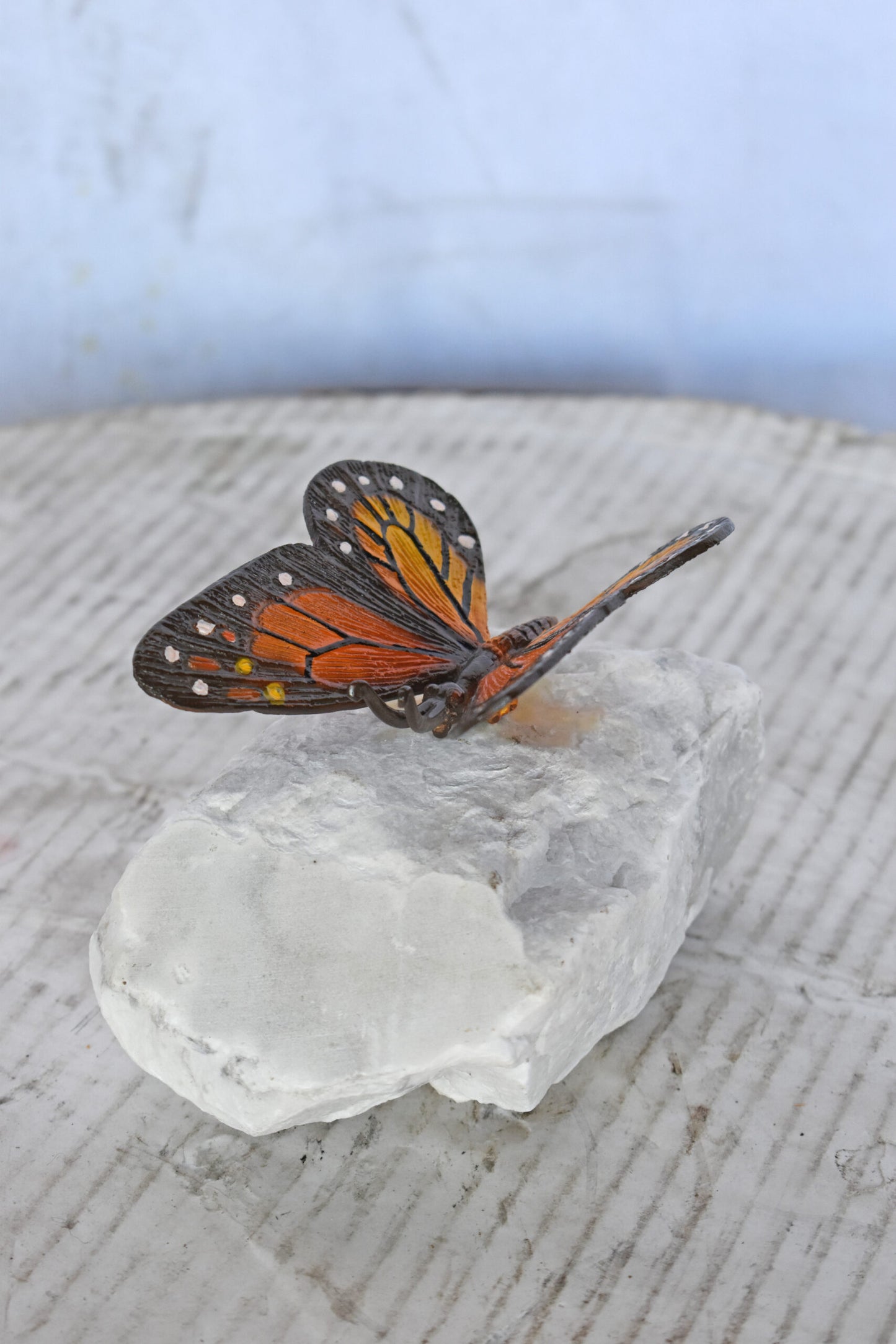 Black and Orange Butterfly made of Bronze mounted on a rock Size: 5" x 5" x 4"H