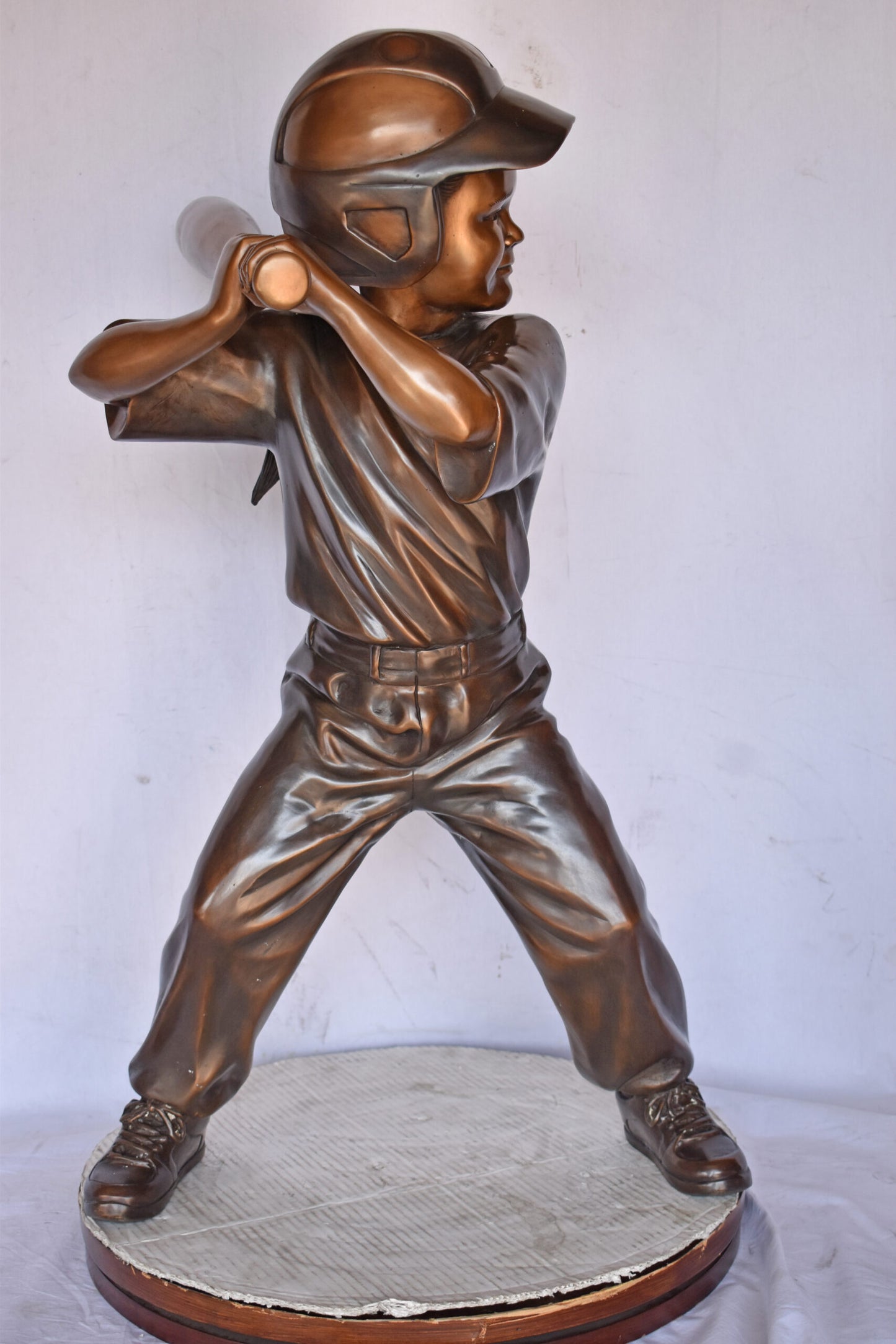 Girl batting a Baseball in Action Bronze Statue - Size: 20"L x 21"W x 40"H.