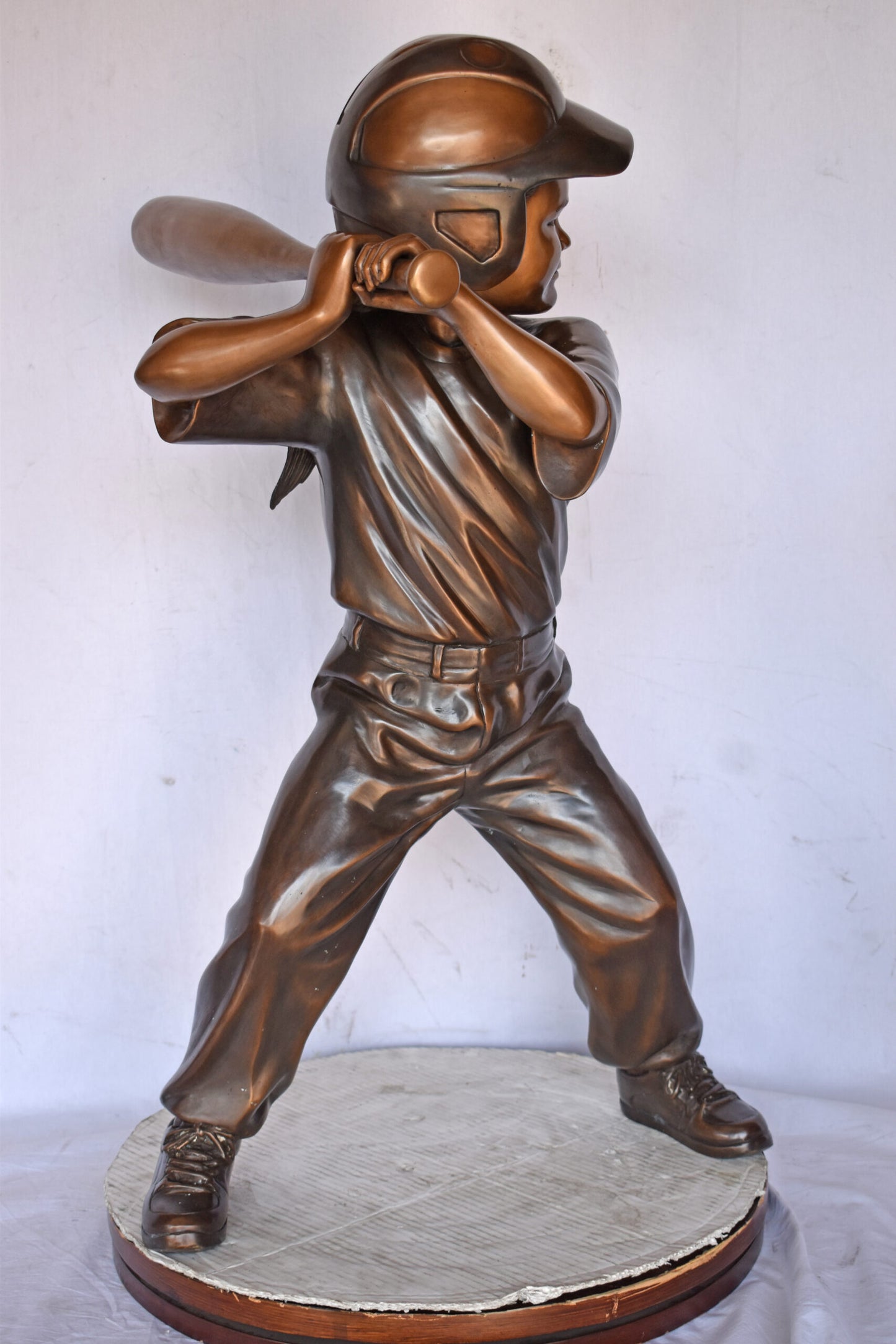 Girl batting a Baseball in Action Bronze Statue - Size: 20"L x 21"W x 40"H.