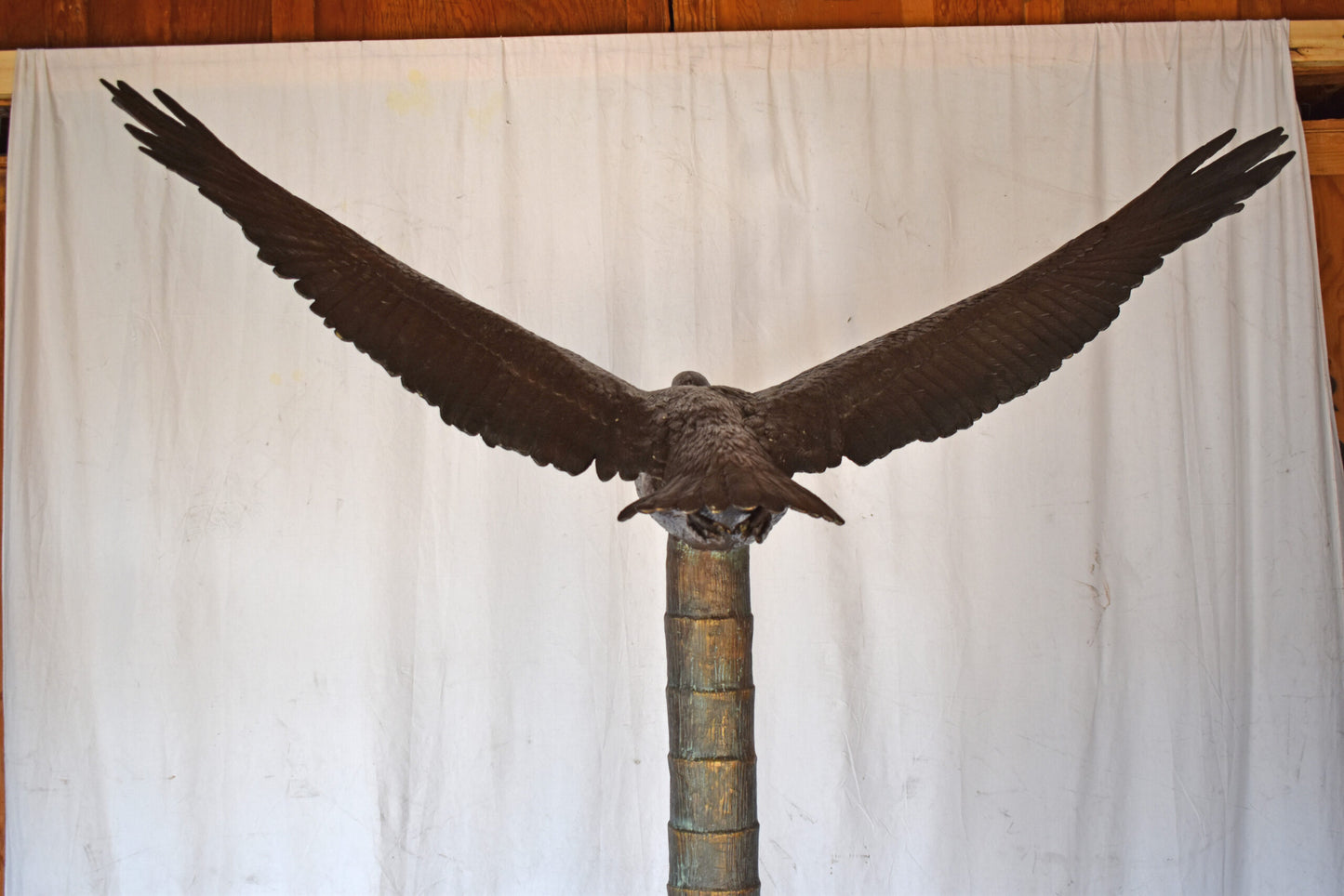Life Size Pelican Flying Bronze Status - Size: 69"L x 45"W x 88"H.