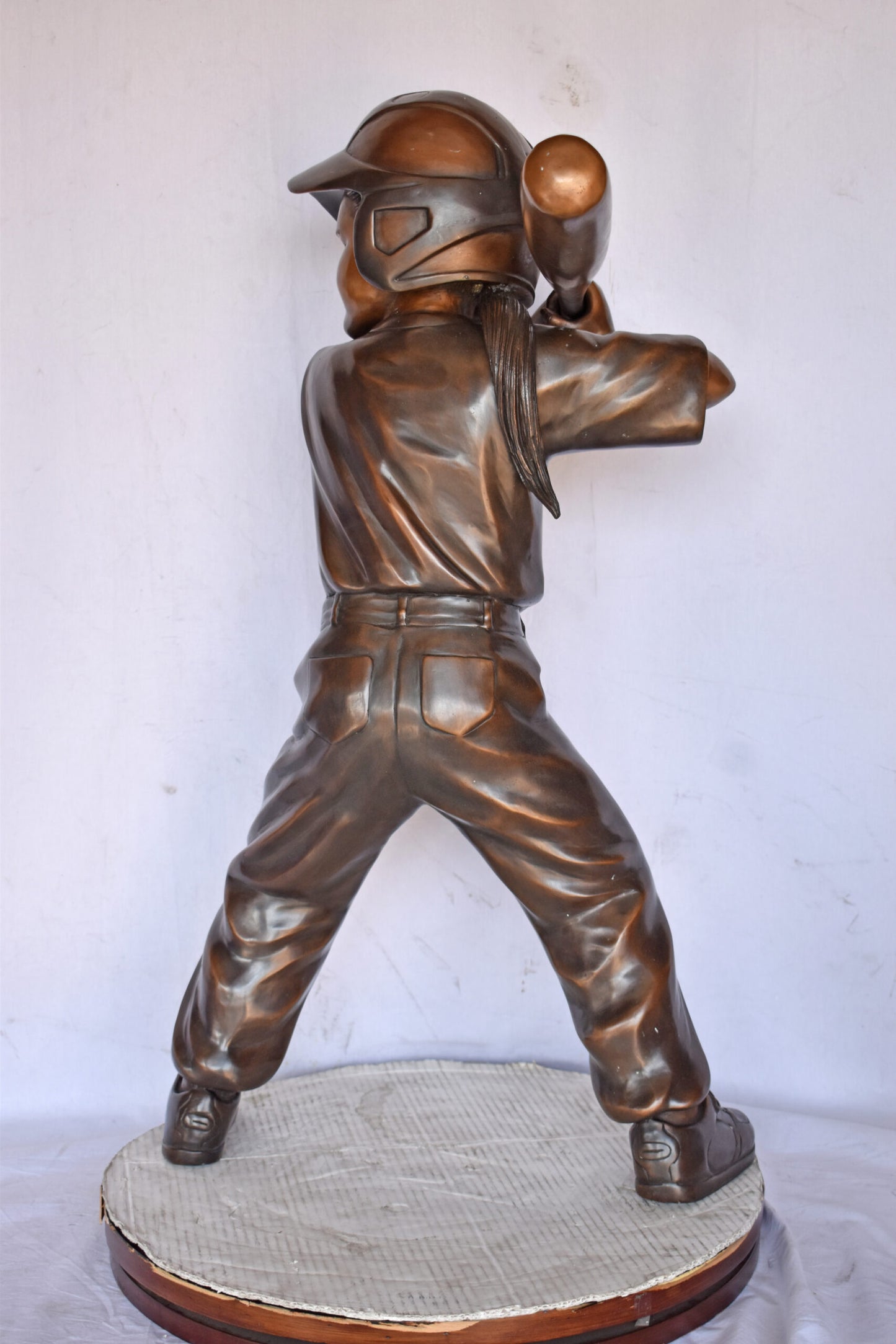 Girl batting a Baseball in Action Bronze Statue - Size: 20"L x 21"W x 40"H.