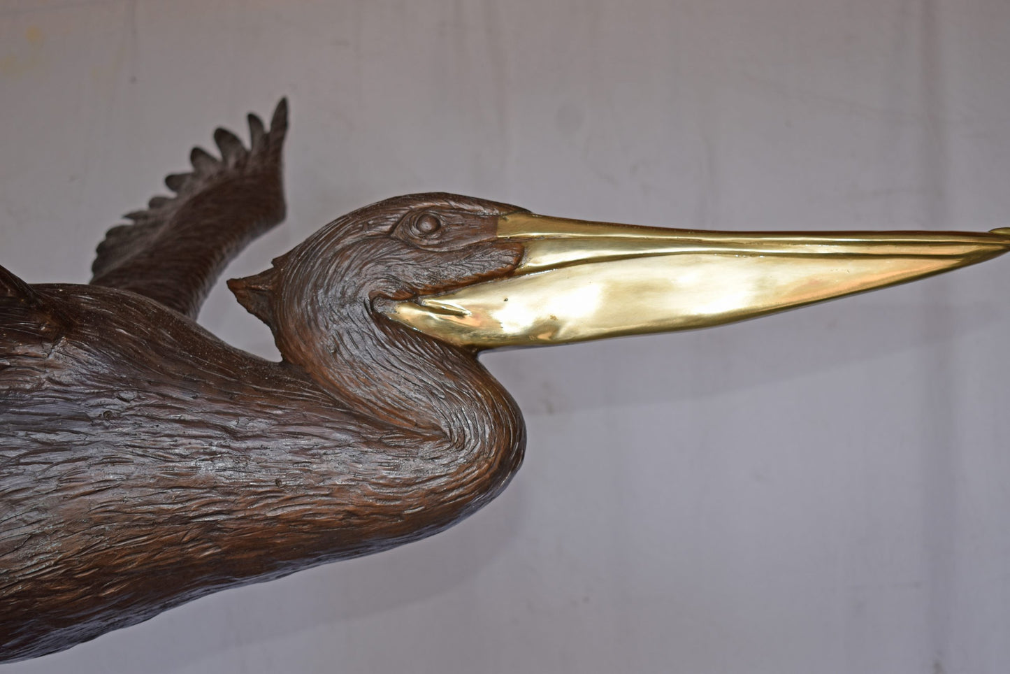 Life Size Pelican on a Three Bronze Statue - Size: 55"L x 46"W x 60"H.