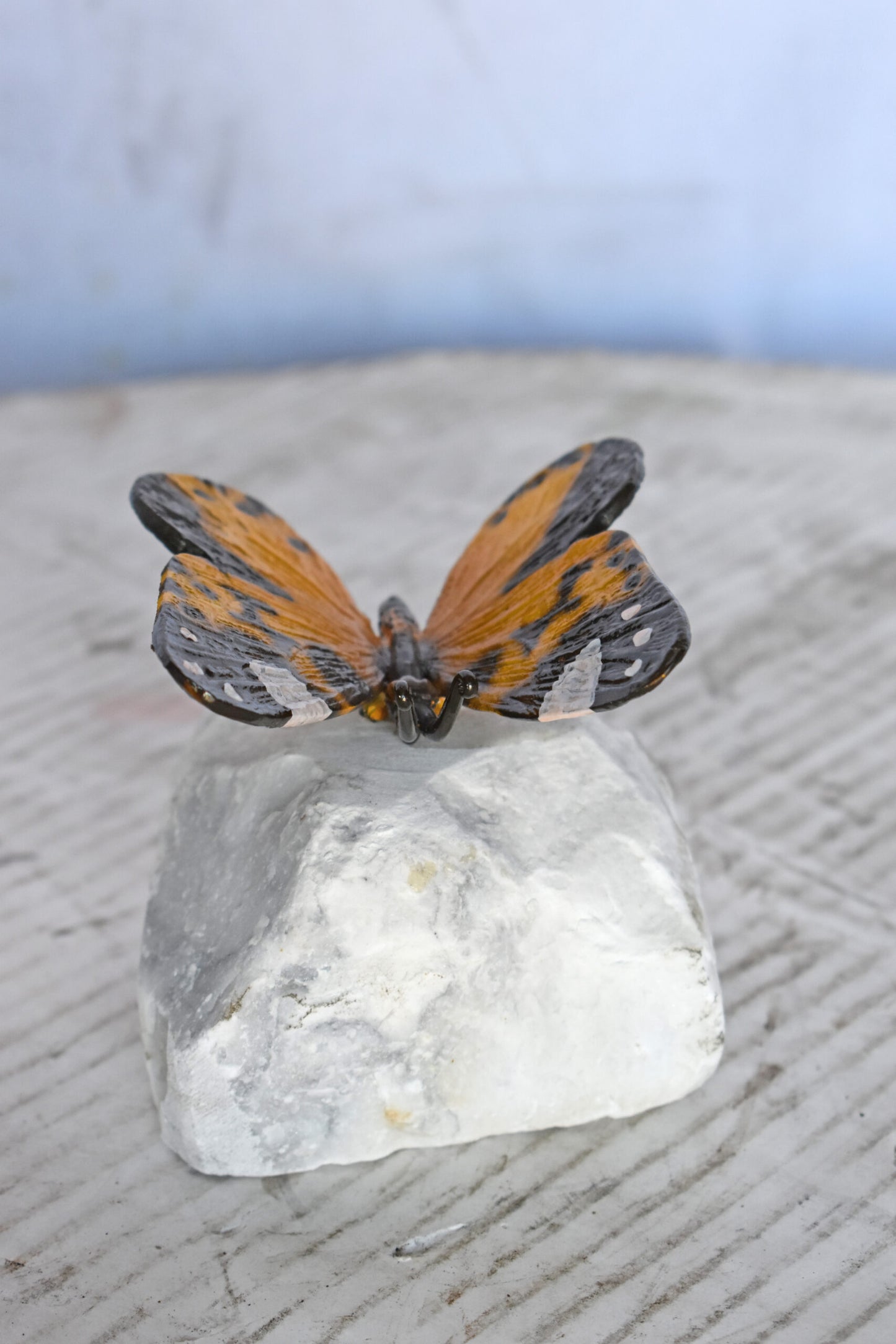 Orange Butterfly made of Bronze mounted on a rock - Size: 5"L x 5"W x 4"H.