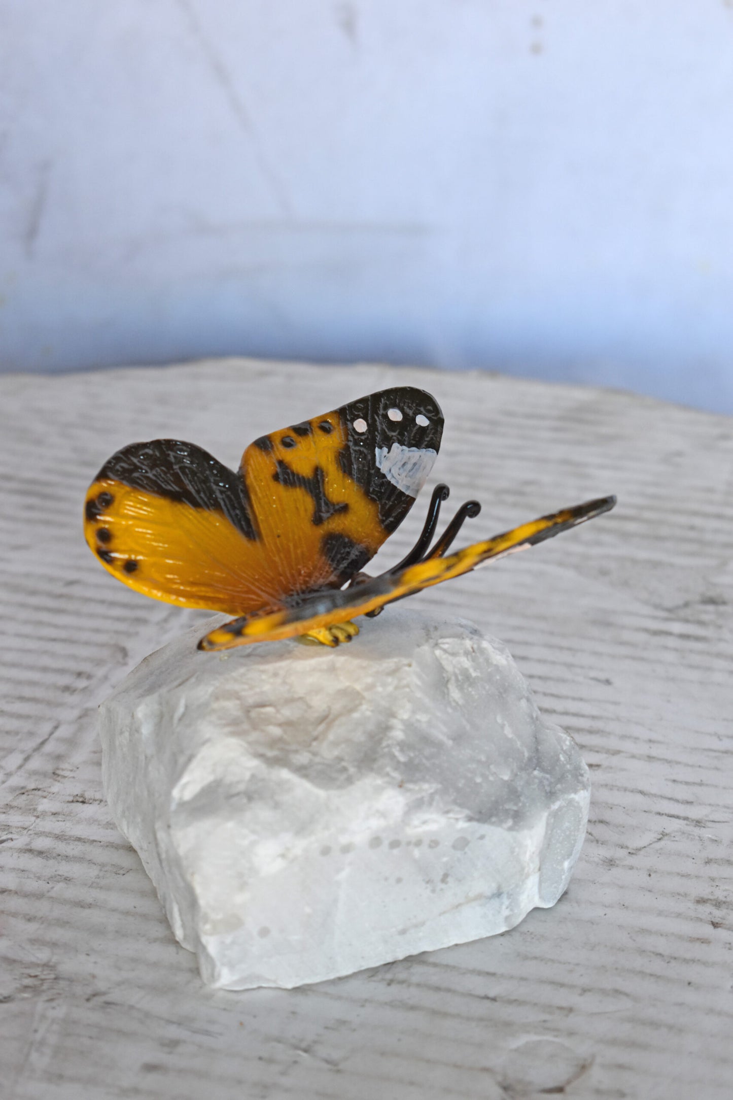 Orange Butterfly made of Bronze mounted on a rock - Size: 5"L x 5"W x 4"H.