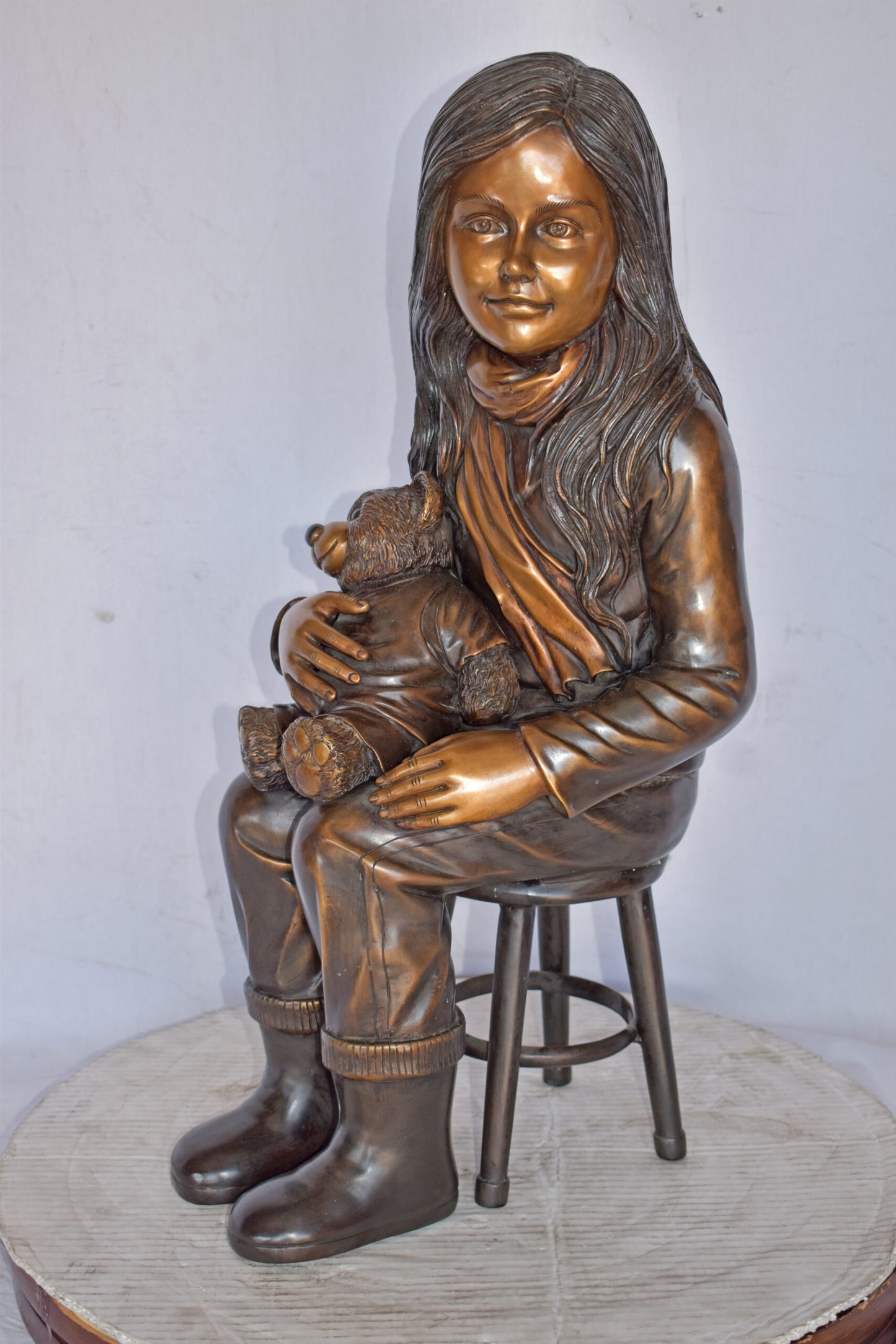 Girl Sitting with her Teddy bear Bronze Statue - Size: 12" x 15" x 27"H.