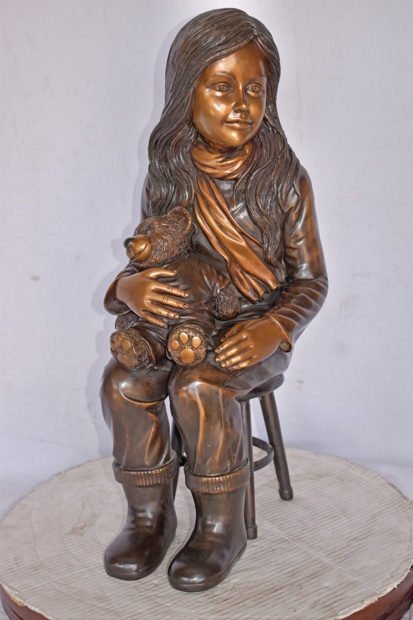 Girl Sitting with her Teddy bear Bronze Statue - Size: 12" x 15" x 27"H.