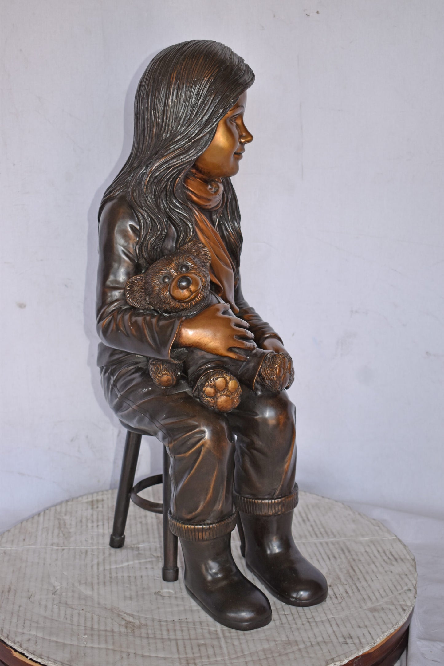 Girl Sitting with her Teddy bear Bronze Statue - Size: 12" x 15" x 27"H.