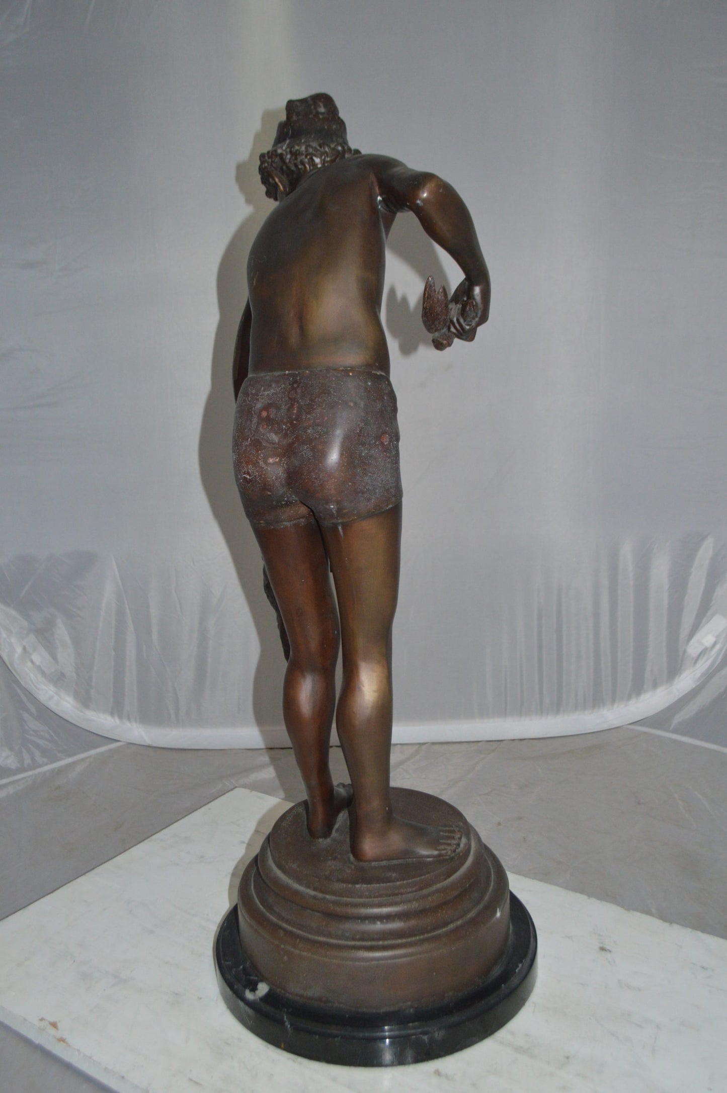 Boy holding a Dog and a Bird Bronze Statue - Size: 15"L x 15"W x 36"H.