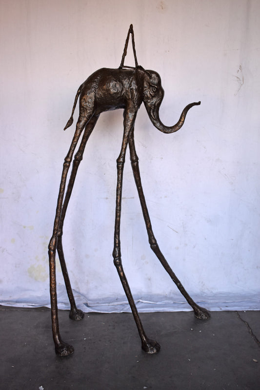 Modern Art Brown Patina Tall Elephant Bronze Statue - Size: 26"L x 27"W x 67"H.