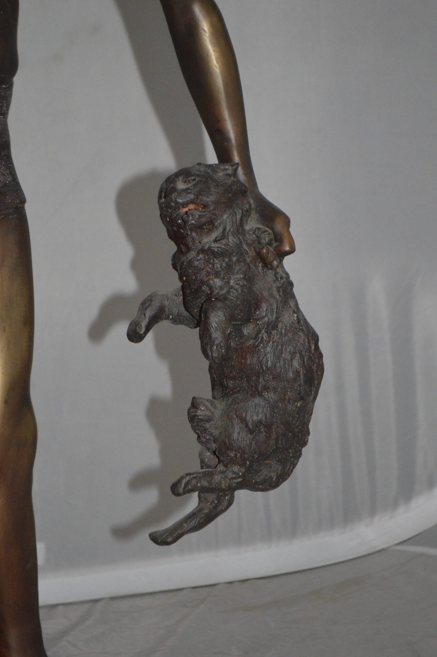 Boy holding a Dog and a Bird Bronze Statue - Size: 15"L x 15"W x 36"H.