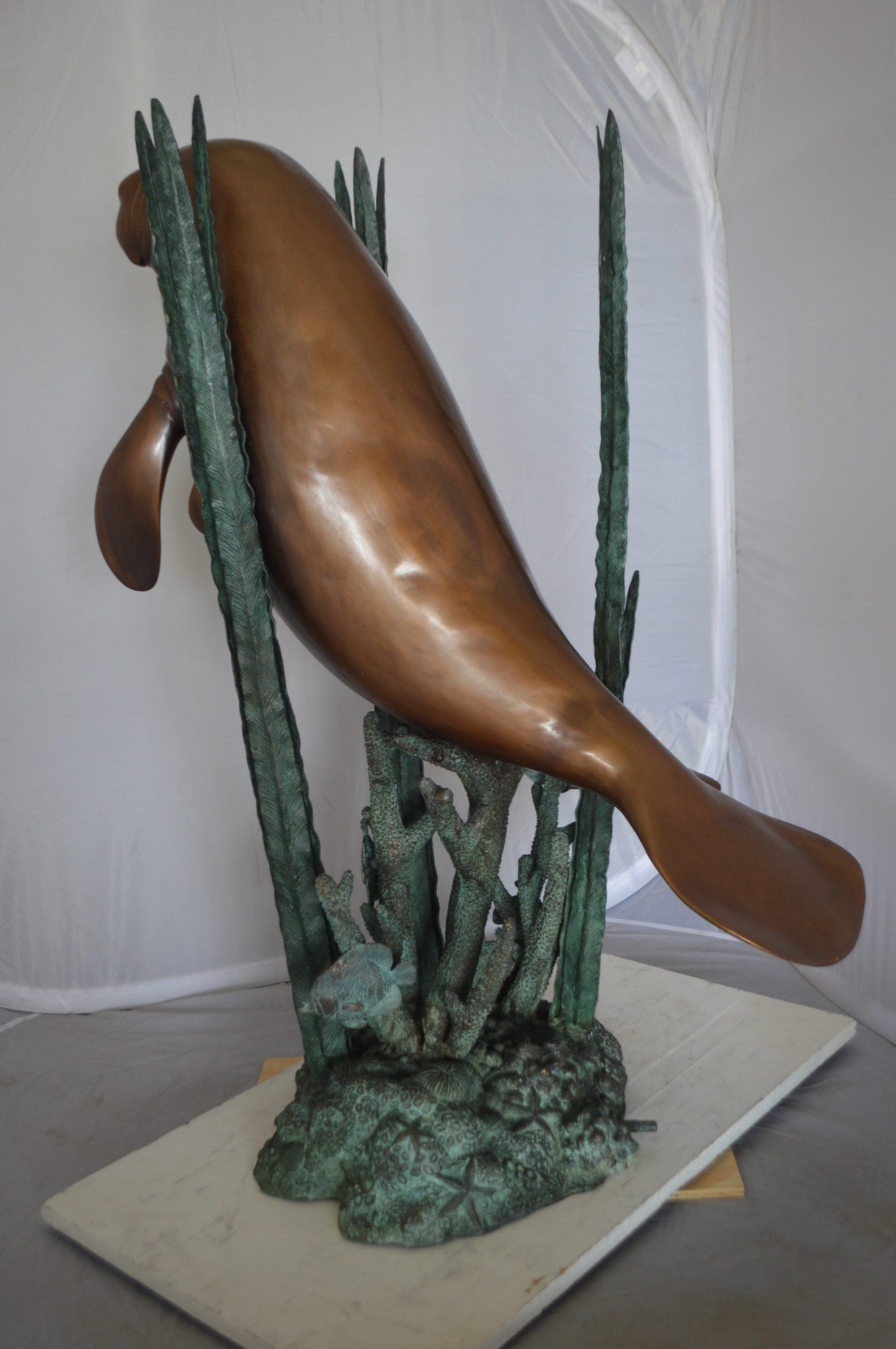 Two Large Manatees swimming Bronze Fountain Statue -  Size: 23"L x 42"W x 42"H.