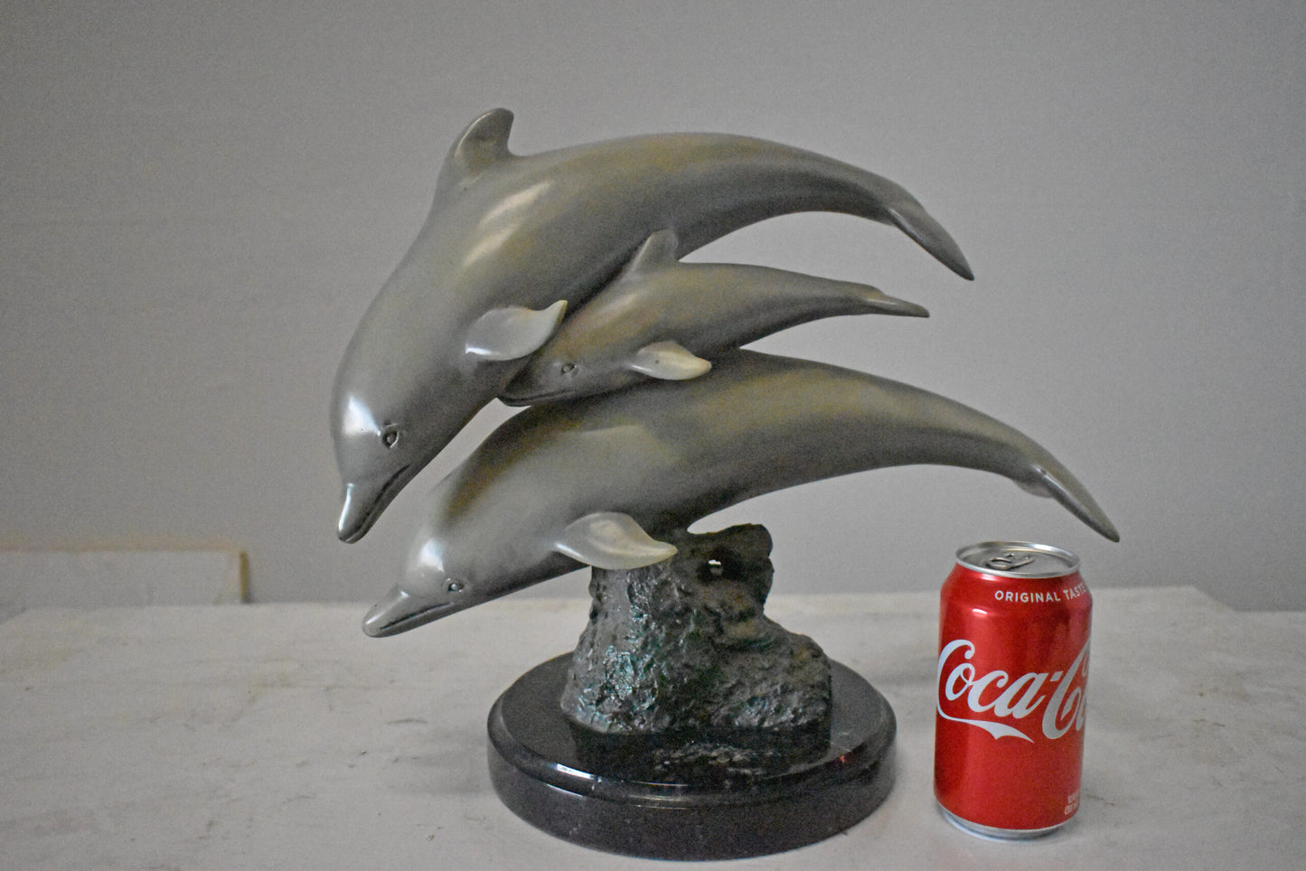Three Grey Dolphins Swimming Bronze Statue on Marble - Size: 16"L x 9"W x 13"H.