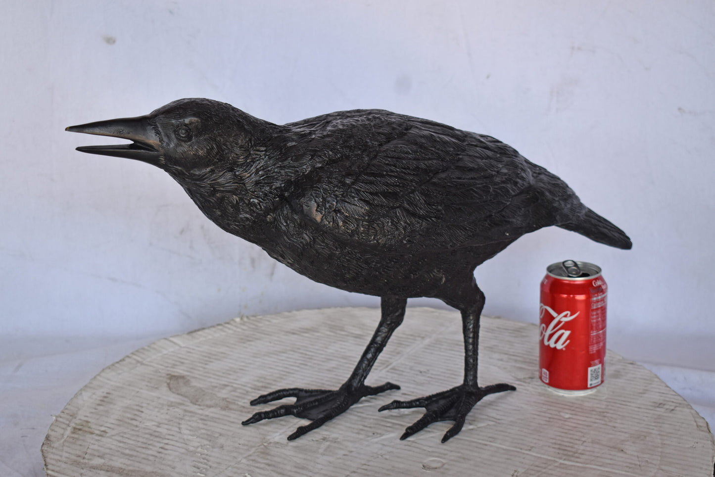 Raven Watching Forward Bronze State - Size: 22"L x 5"W x 7"H.