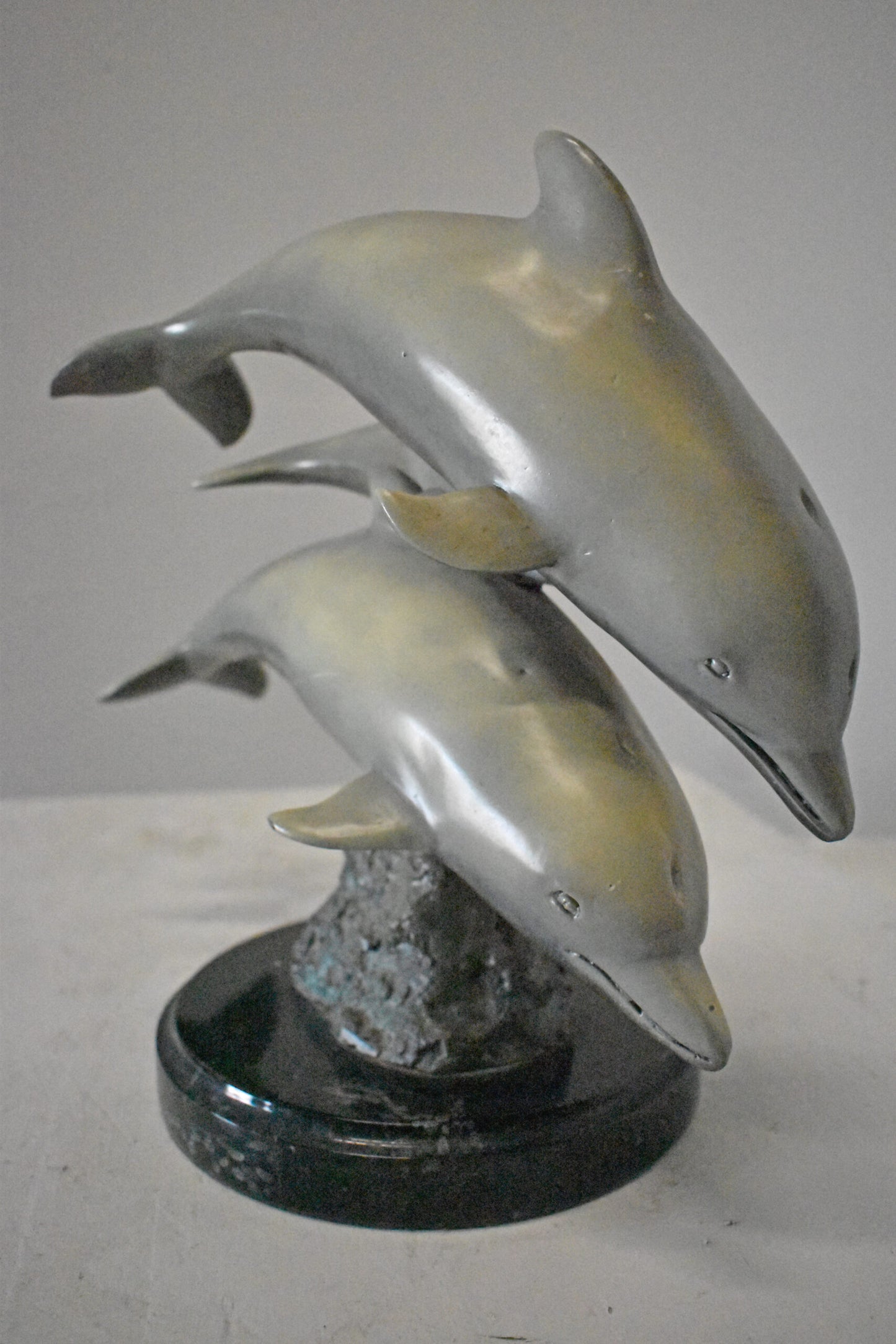 Three Grey Dolphins Swimming Bronze Statue on Marble - Size: 16"L x 9"W x 13"H.