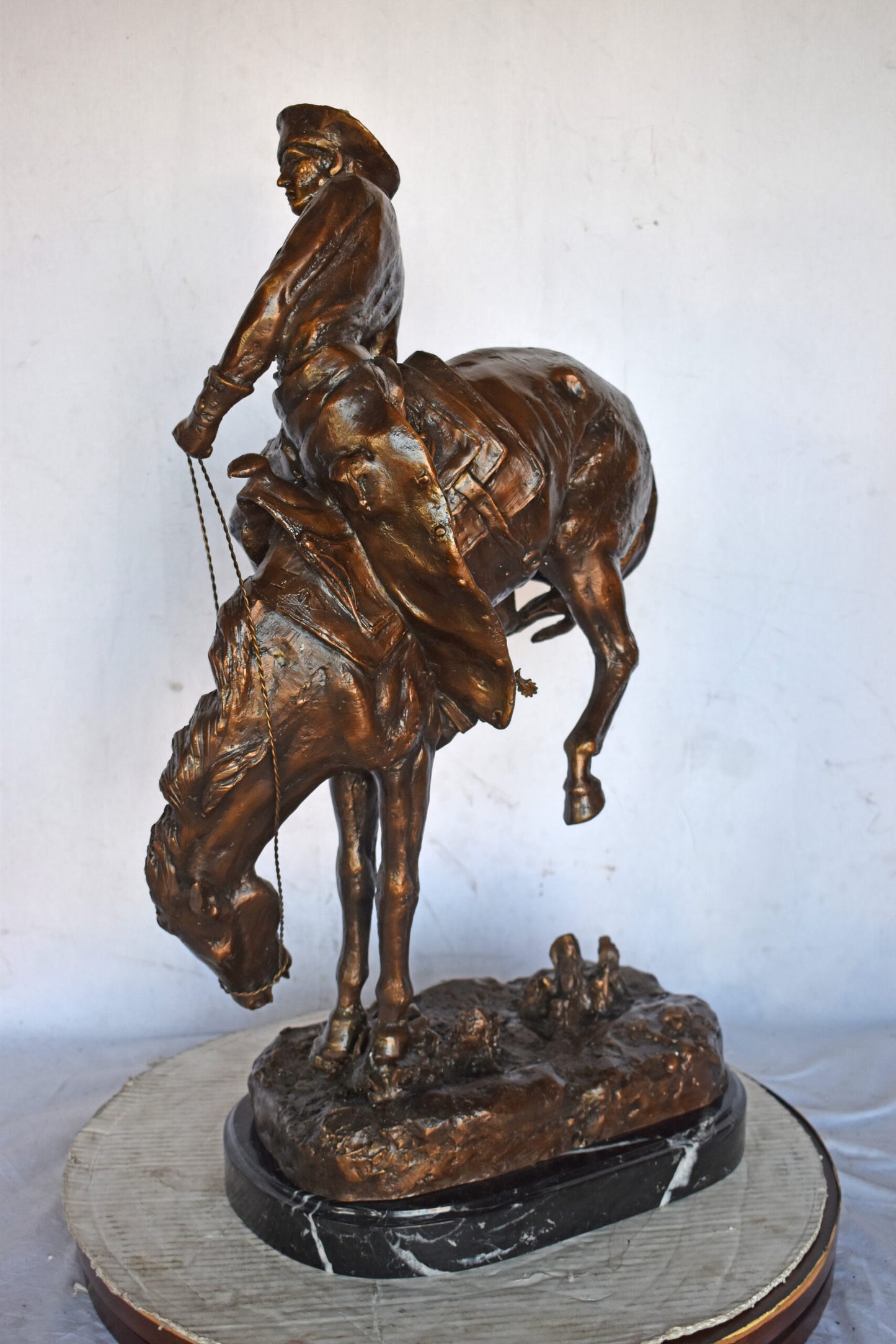 Outlaw by Remington Bronze Statue Replica - Size: 18"L x 10"W x 32"H.