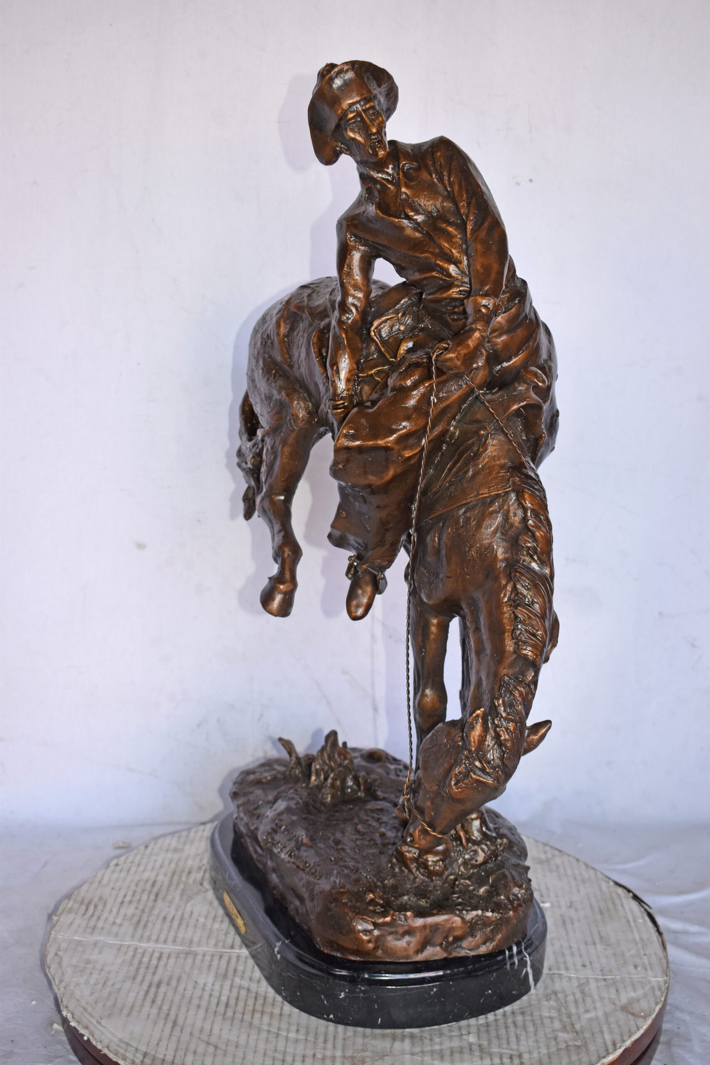 Outlaw by Remington Bronze Statue Replica - Size: 18"L x 10"W x 32"H.