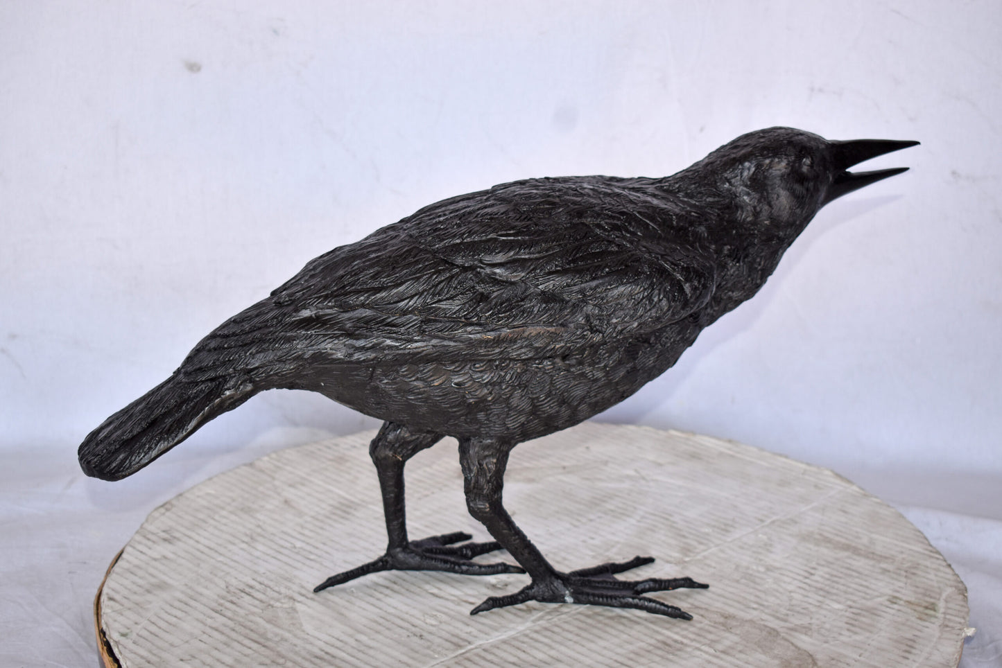 Raven Watching Forward Bronze State - Size: 22"L x 5"W x 7"H.