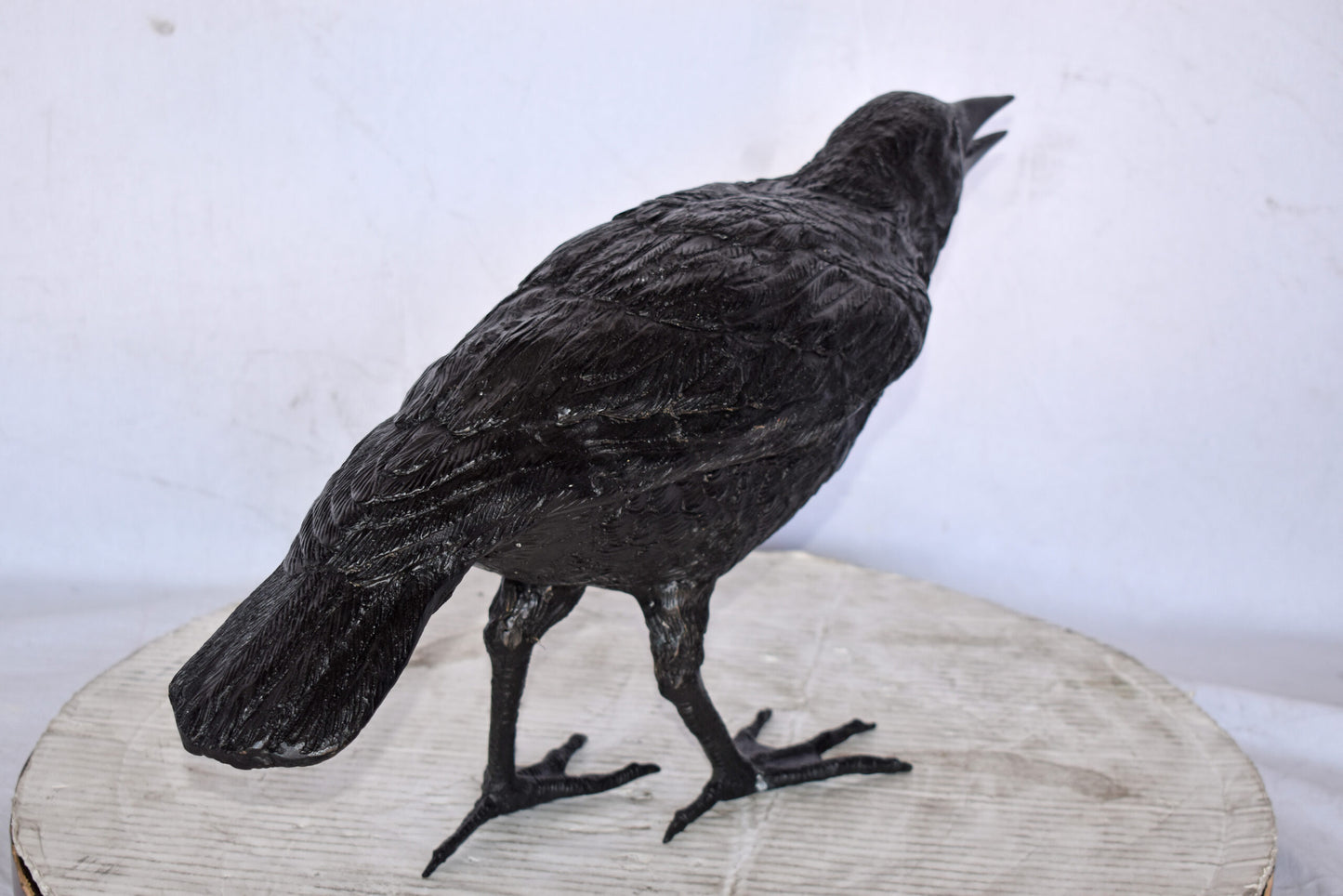Raven Watching Forward Bronze State - Size: 22"L x 5"W x 7"H.