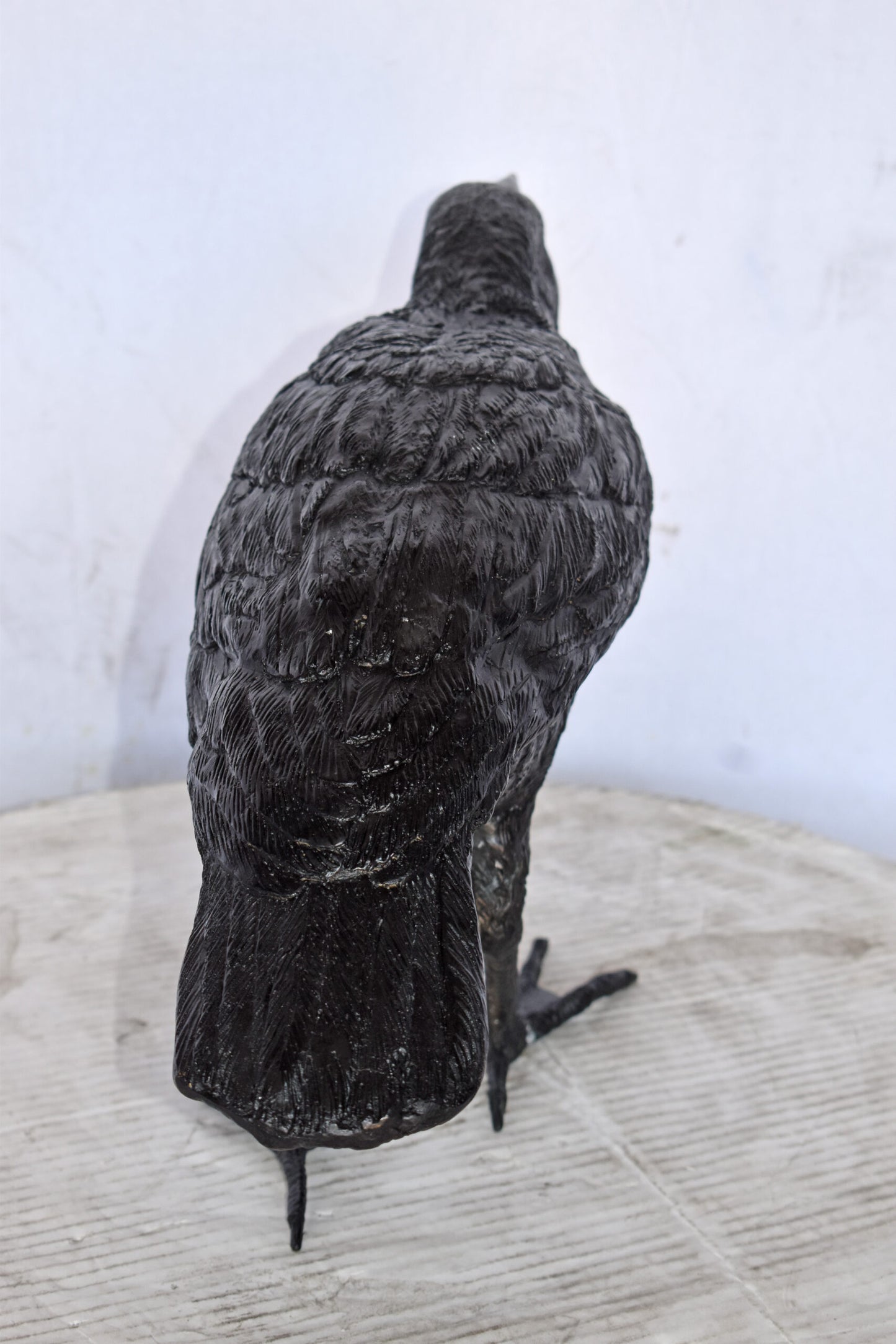 Raven Watching Forward Bronze State - Size: 22"L x 5"W x 7"H.