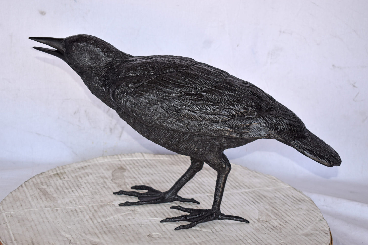 Raven Watching Forward Bronze State - Size: 22"L x 5"W x 7"H.