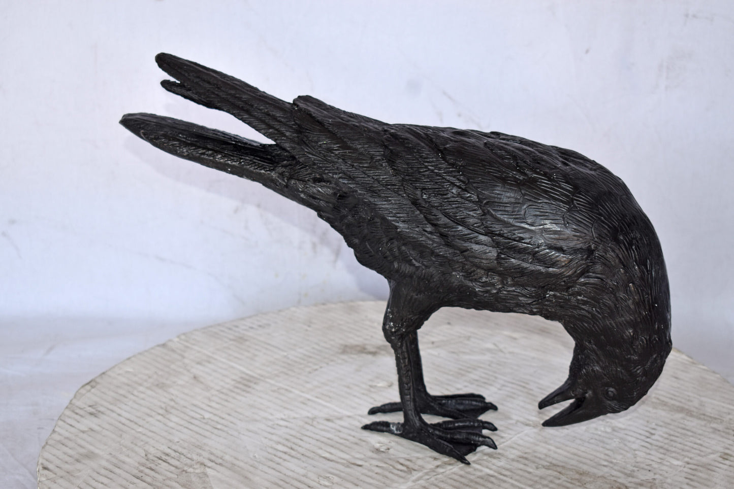 Raven Looking Down Bronze State - Size: 19"L x 5"W x 11"H.