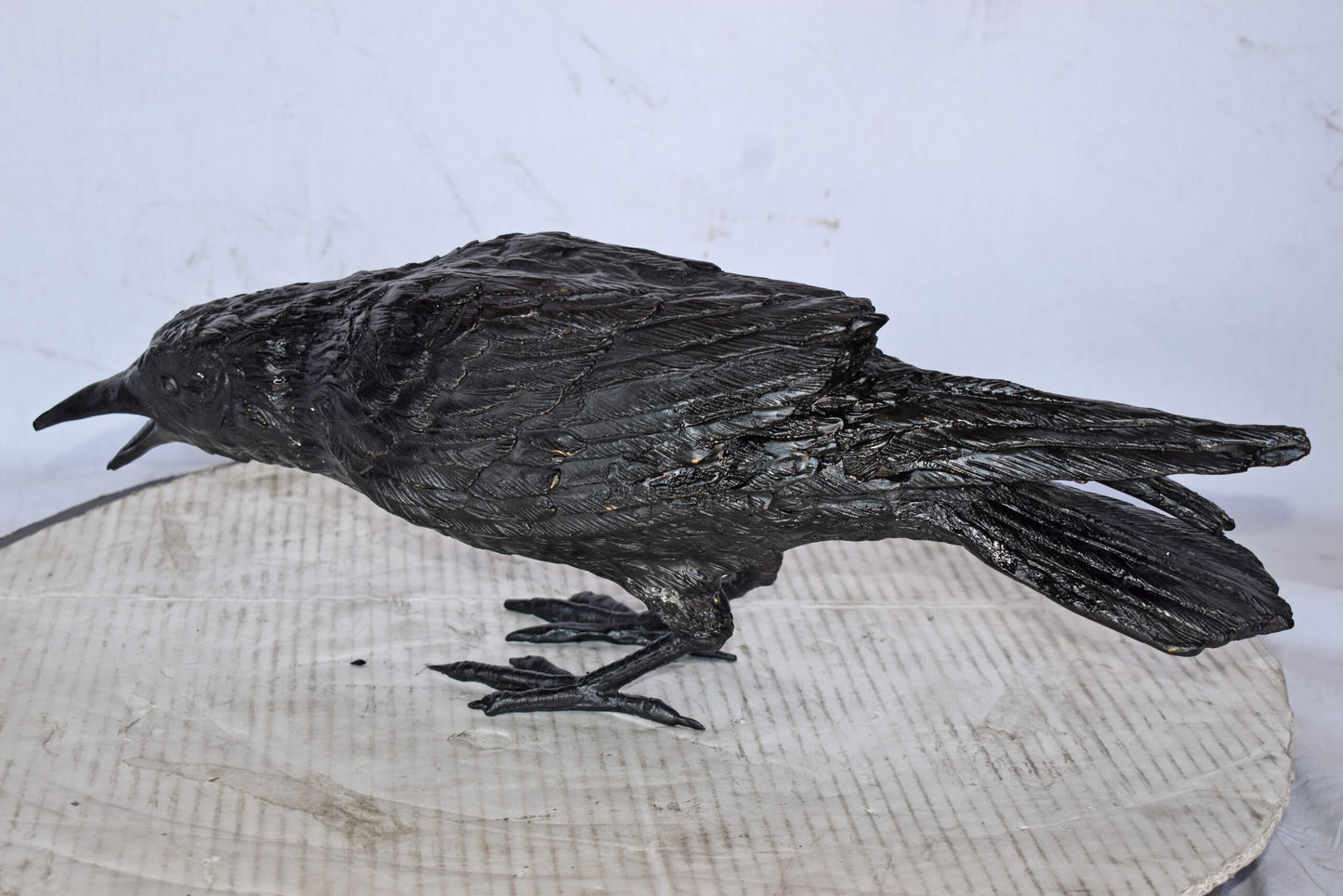 Raven Looking for Food Bronze State - Size: 24"L x 6"W x 12"H.