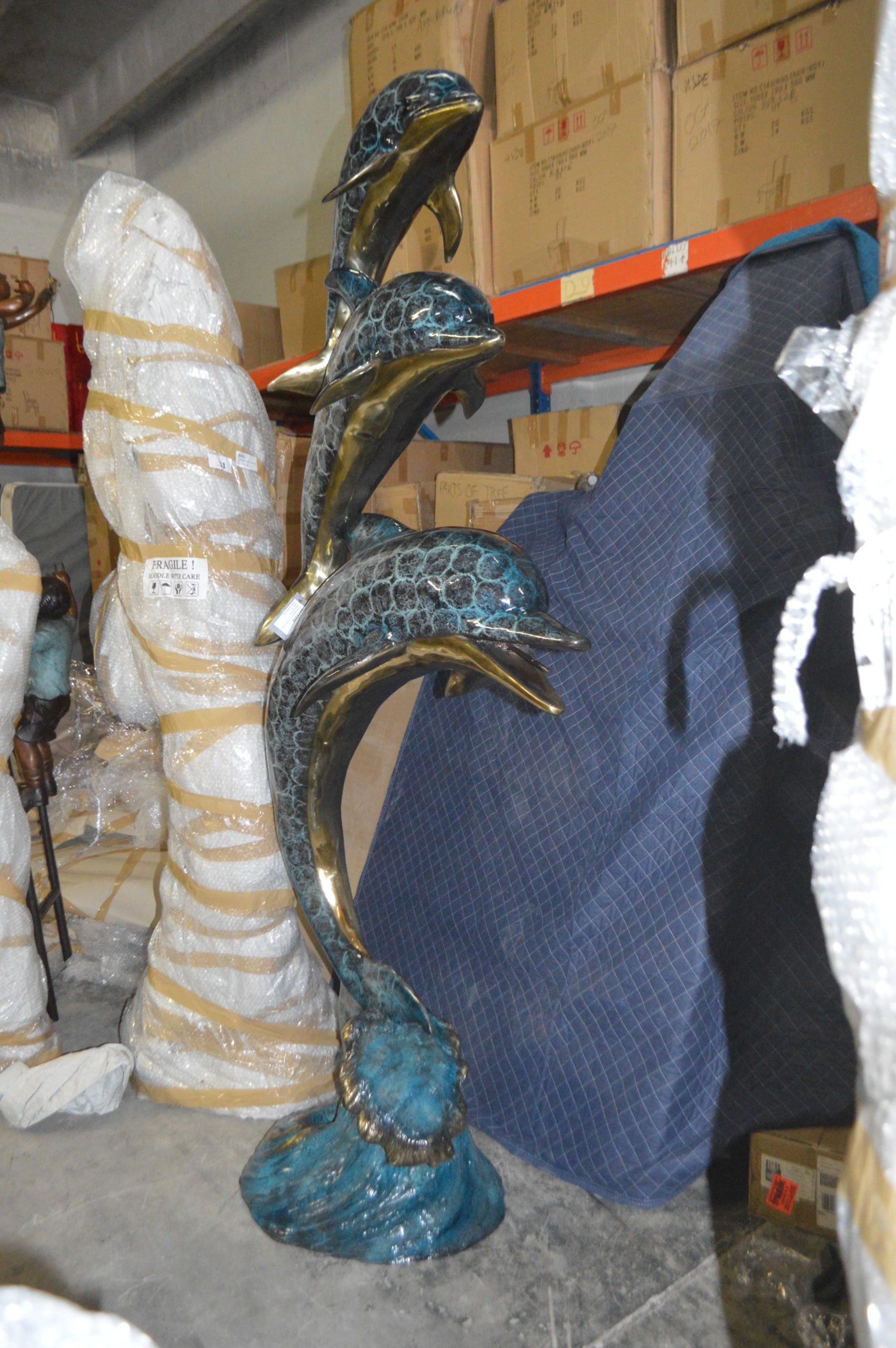 Three Dolphins Overreach Others Bronze Statue -  Size: 28"L x 22"W x 89"H.